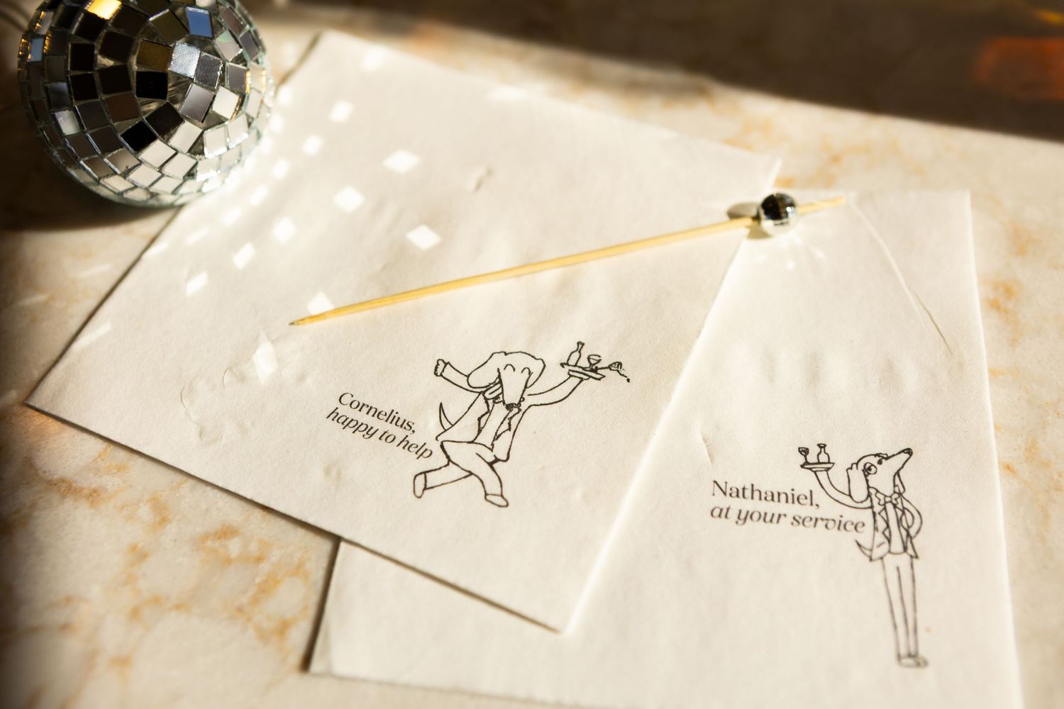 A sequence of small paper sketches showing animated frames of a figure jumping in a simple stick figure style.