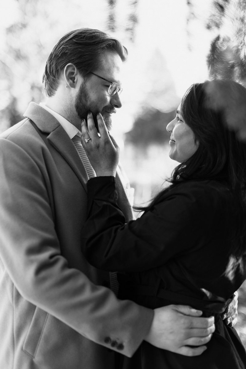 Black and white photo series of a couple sharing intimate moments.