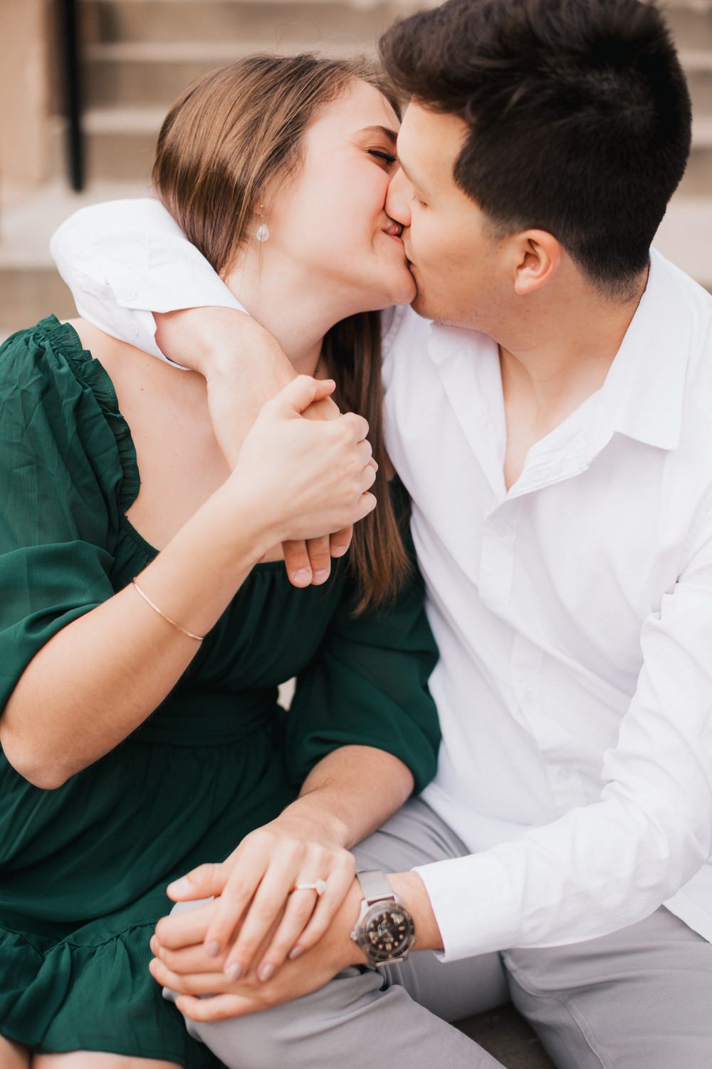 Series of tender moments between couple in green dress and white shirt.
