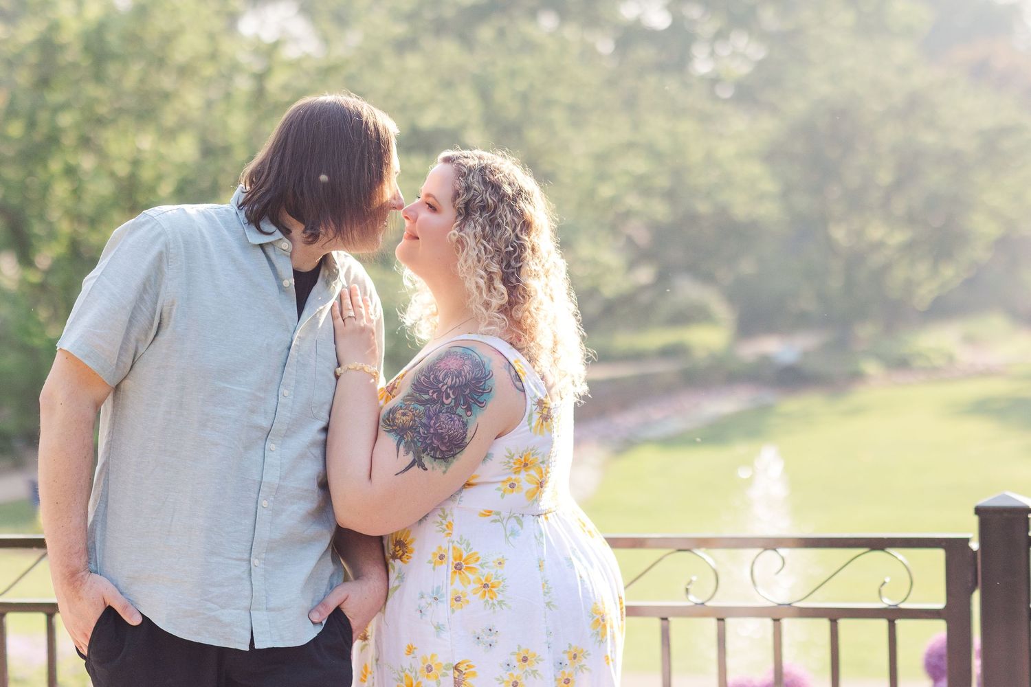 Engagement photo of couple at Lilacia Park Lombard IL at sunset