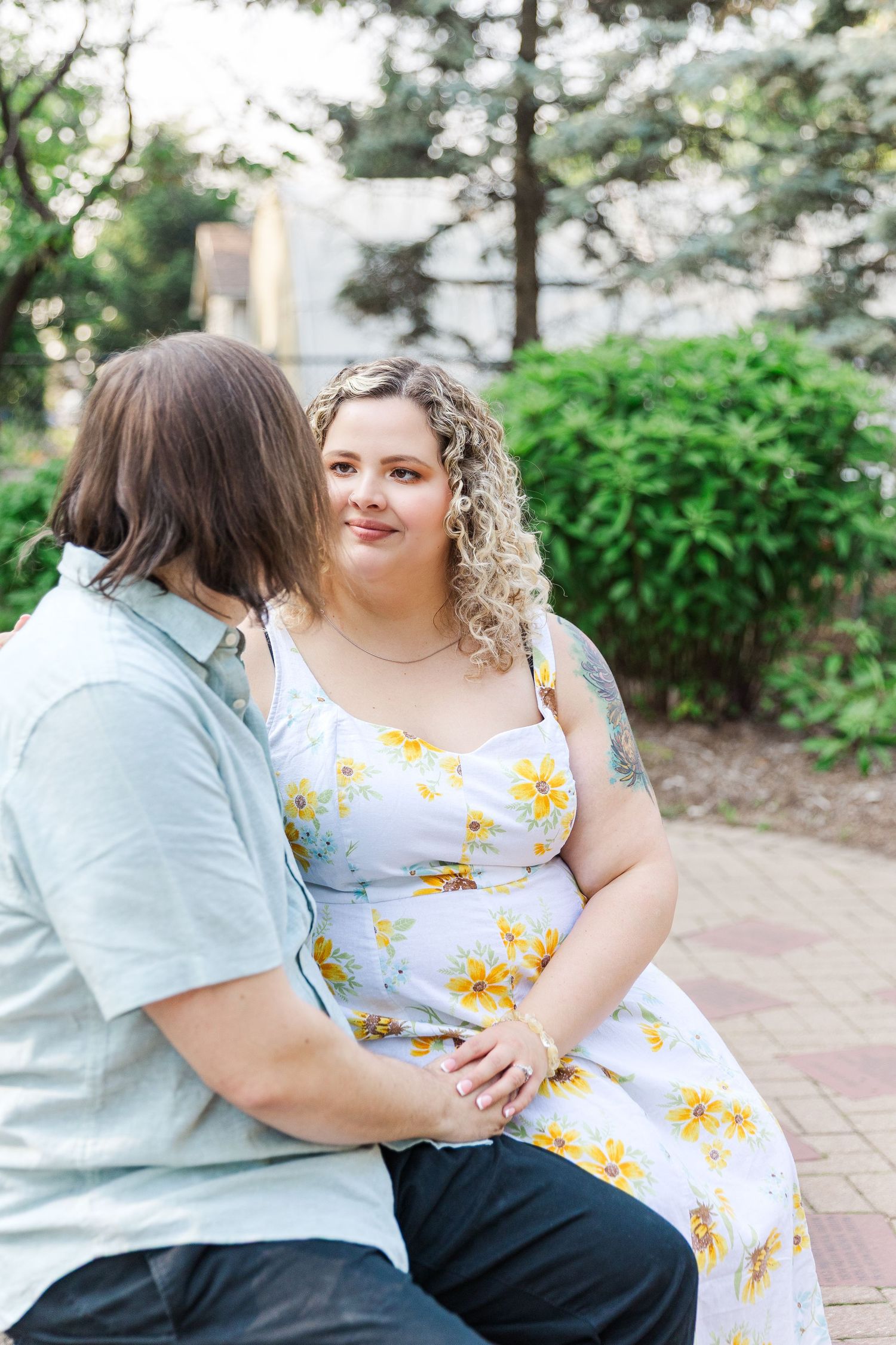 Engagement photo of couple at Lilacia Park Lombard IL at sunset
