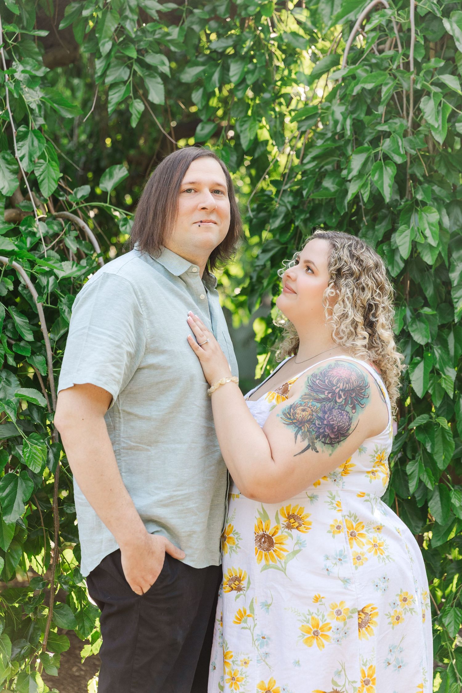 Romantic engagement portraits in garden setting at Lilacia Park Lombard IL