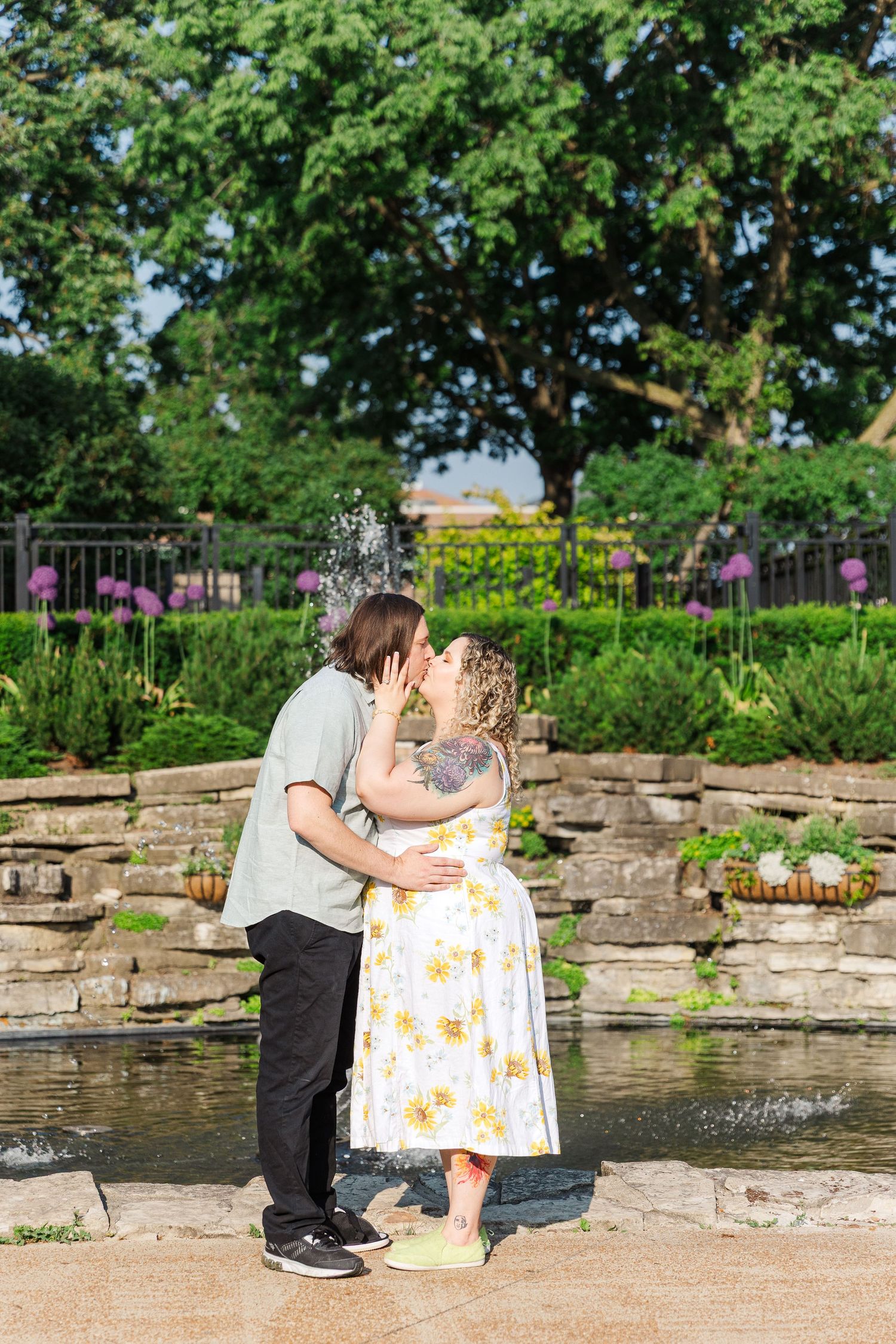 Romantic engagement portraits in garden setting at Lilacia Park Lombard IL