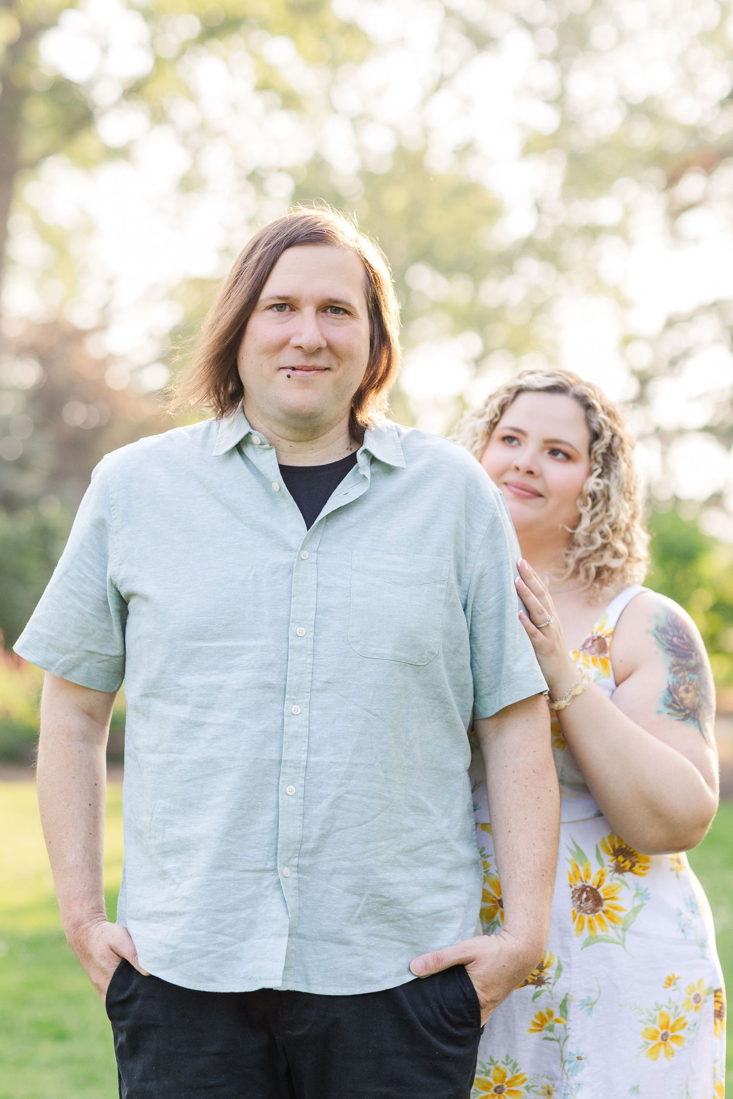 Engagement photo of couple at Lilacia Park Lombard IL at sunset