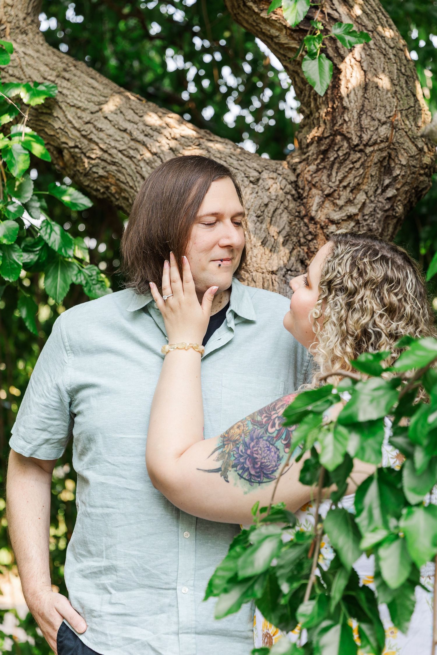 Engagement photo of couple at Lilacia Park Lombard IL at sunset