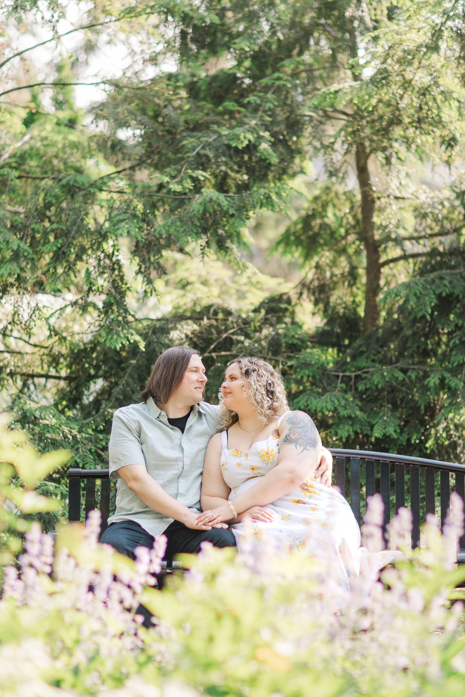 Romantic engagement portraits in garden setting at Lilacia Park Lombard IL