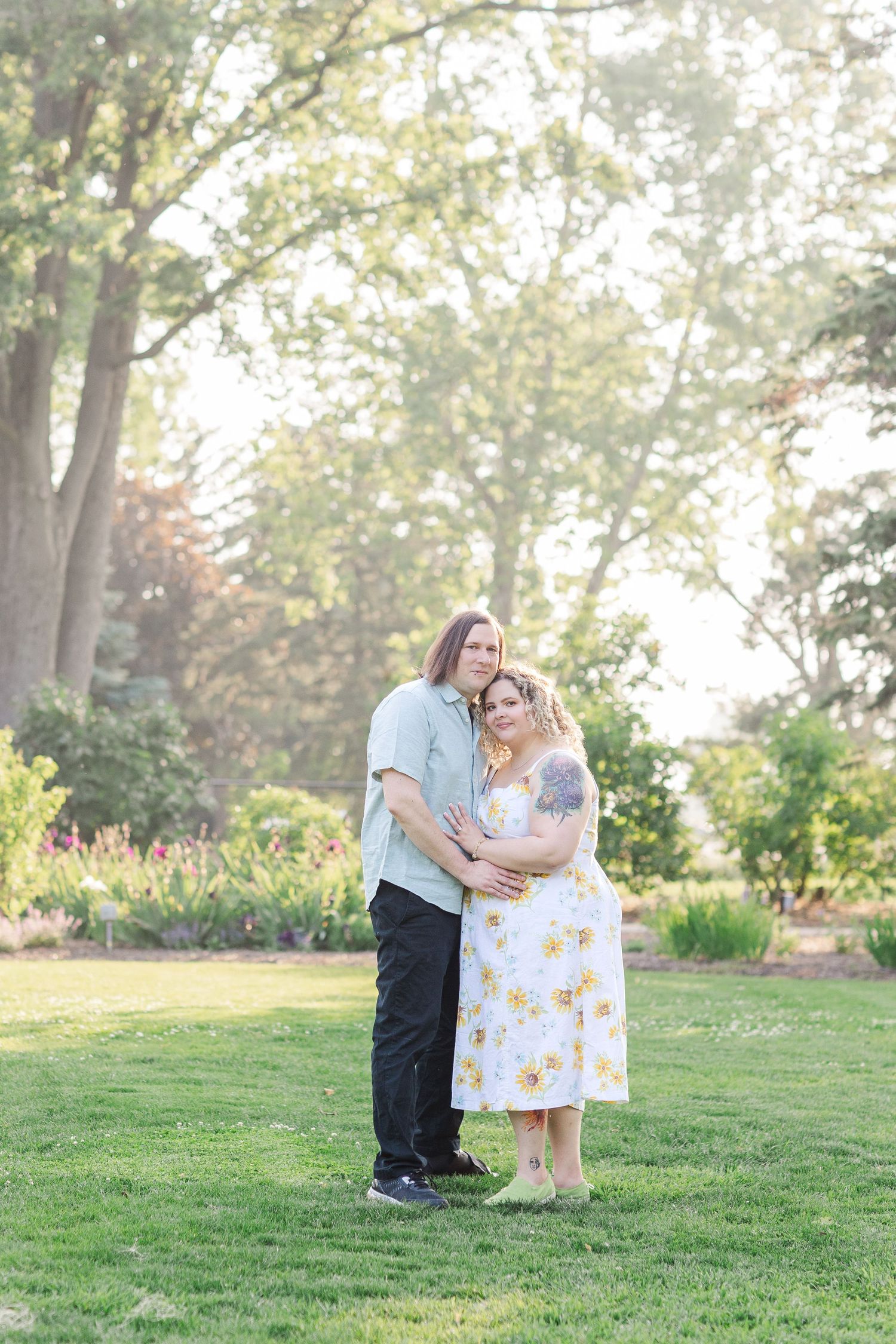 Romantic engagement portraits in garden setting at Lilacia Park Lombard IL