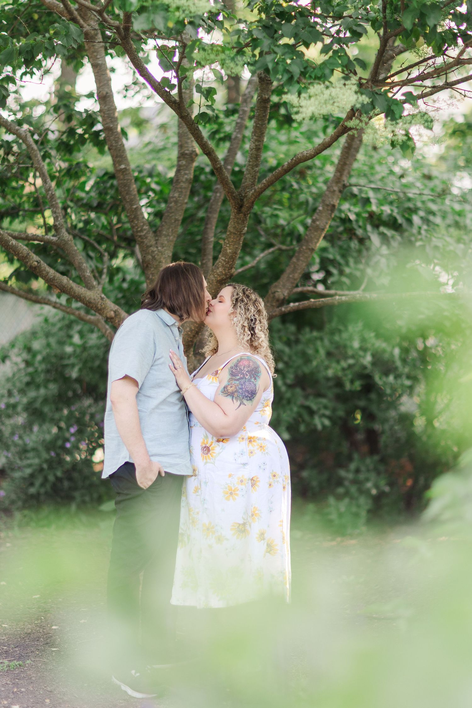Romantic engagement portraits in garden setting at Lilacia Park Lombard IL