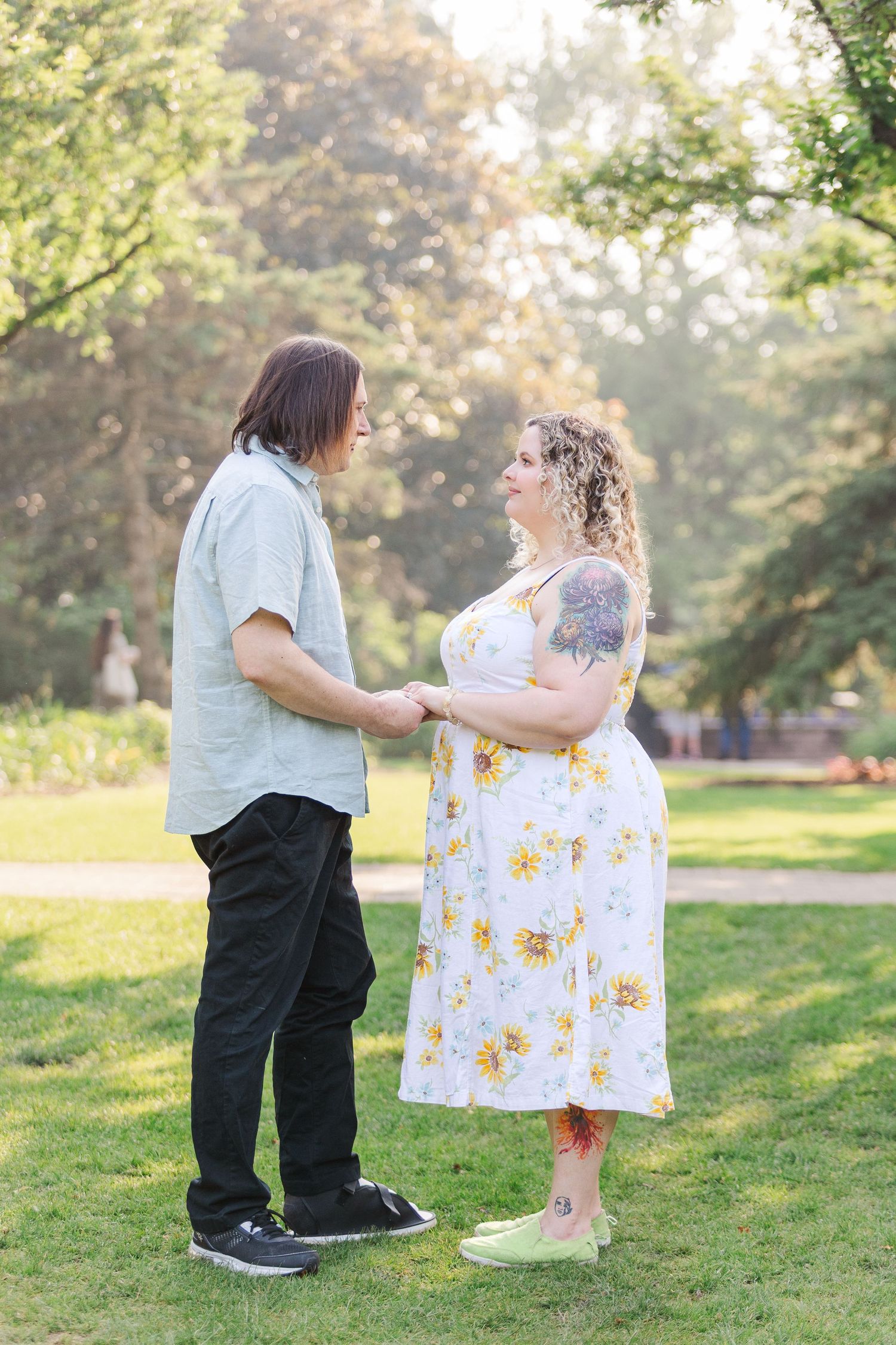 Romantic engagement portraits in garden setting at Lilacia Park Lombard IL