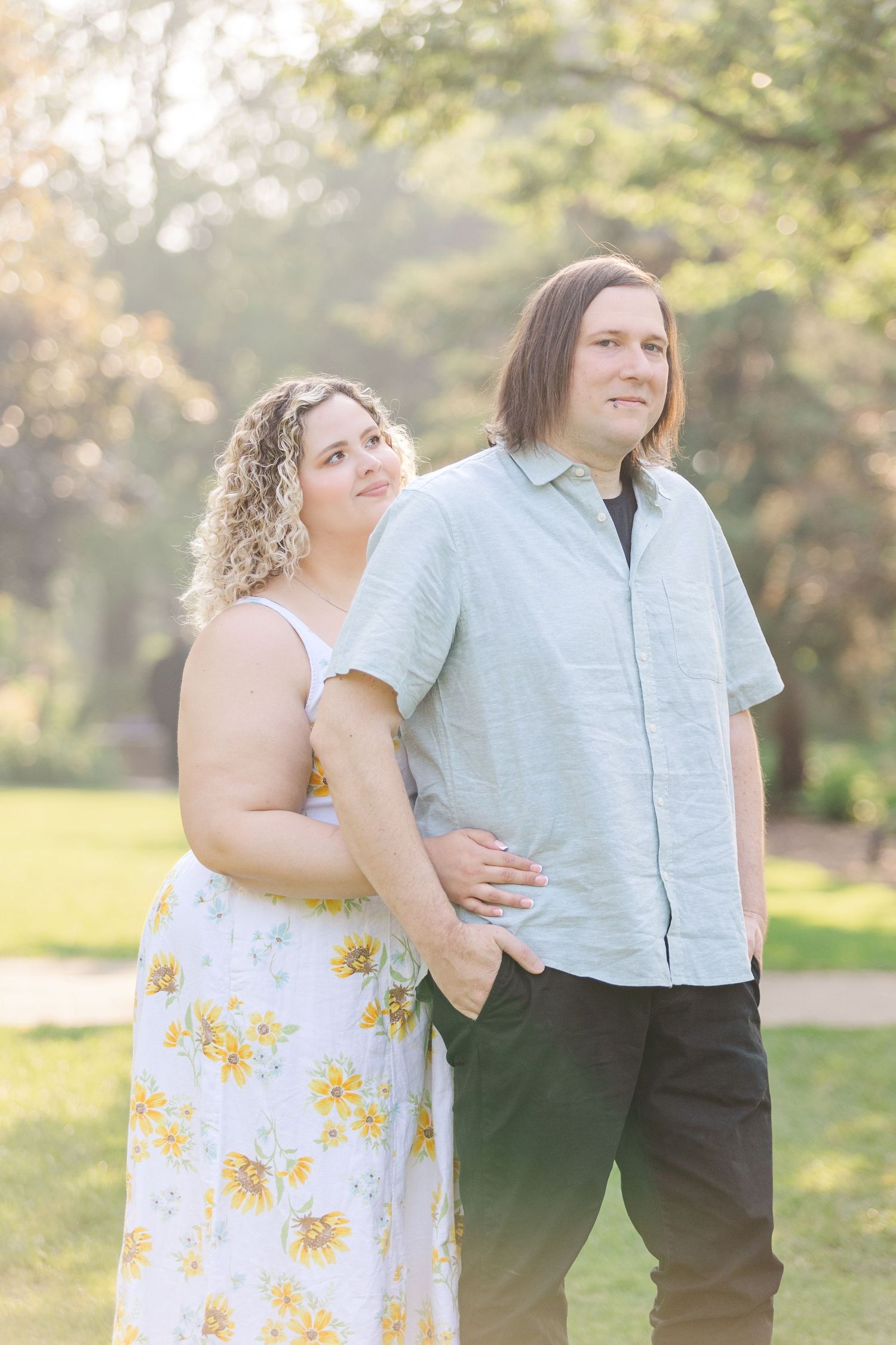 Engagement photo of couple at Lilacia Park Lombard IL at sunset