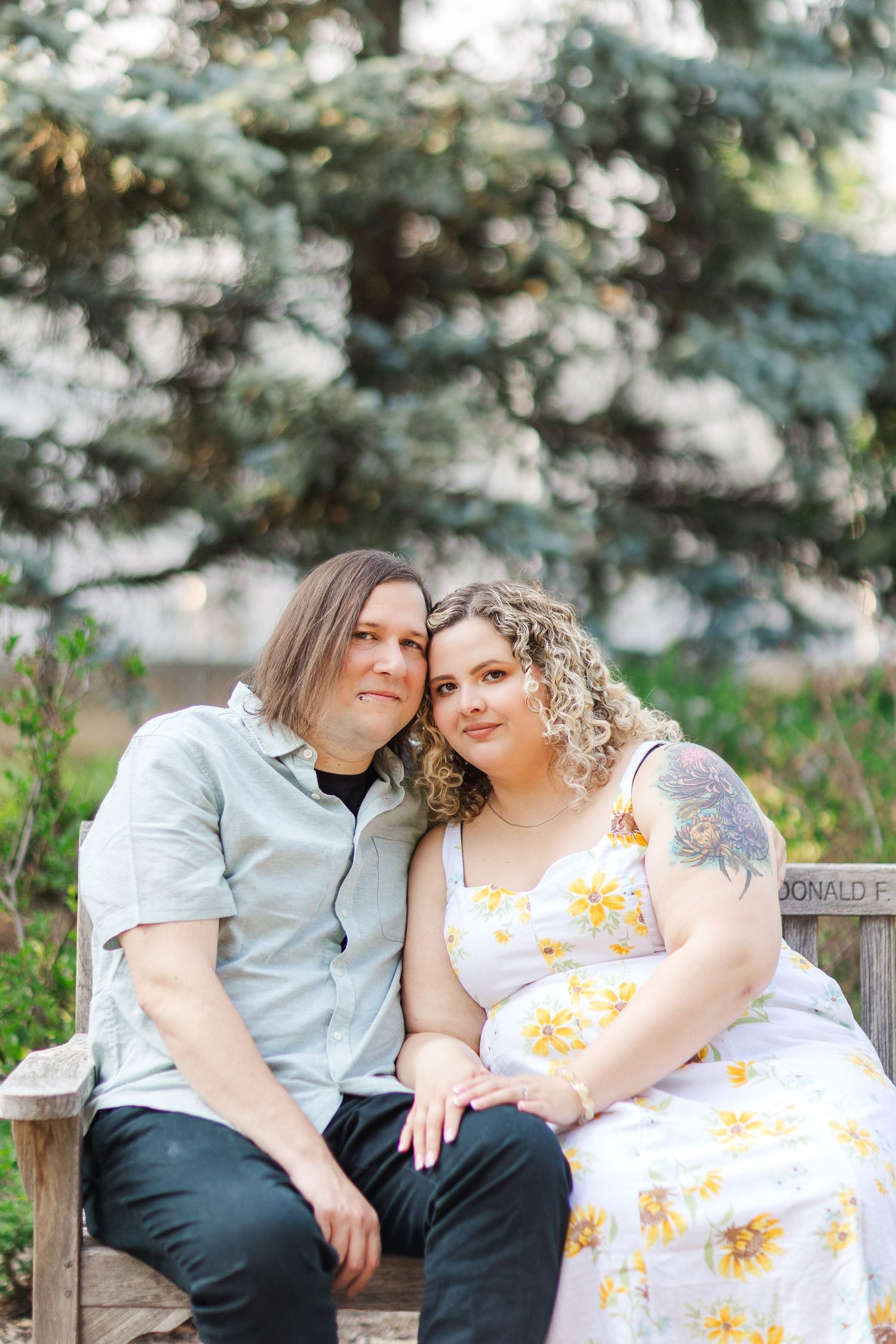 Engagement photo of couple at Lilacia Park Lombard IL at sunset