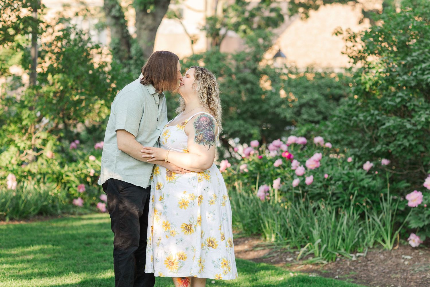 Engagement photo of couple at Lilacia Park Lombard IL at sunset