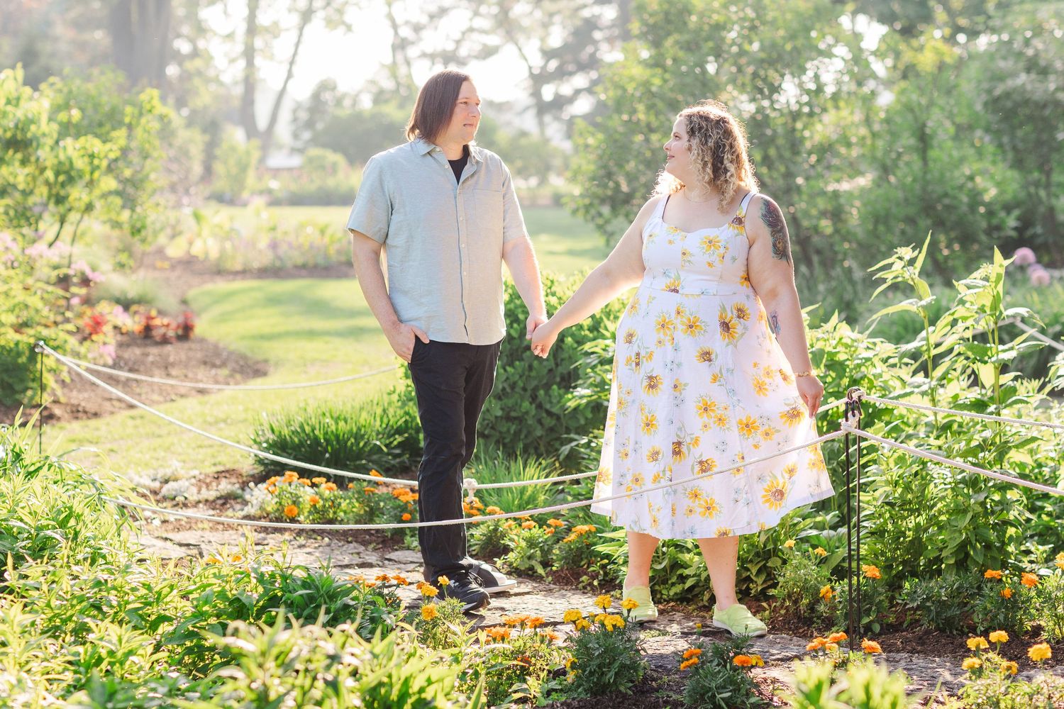 Romantic engagement portraits in garden setting at Lilacia Park Lombard IL