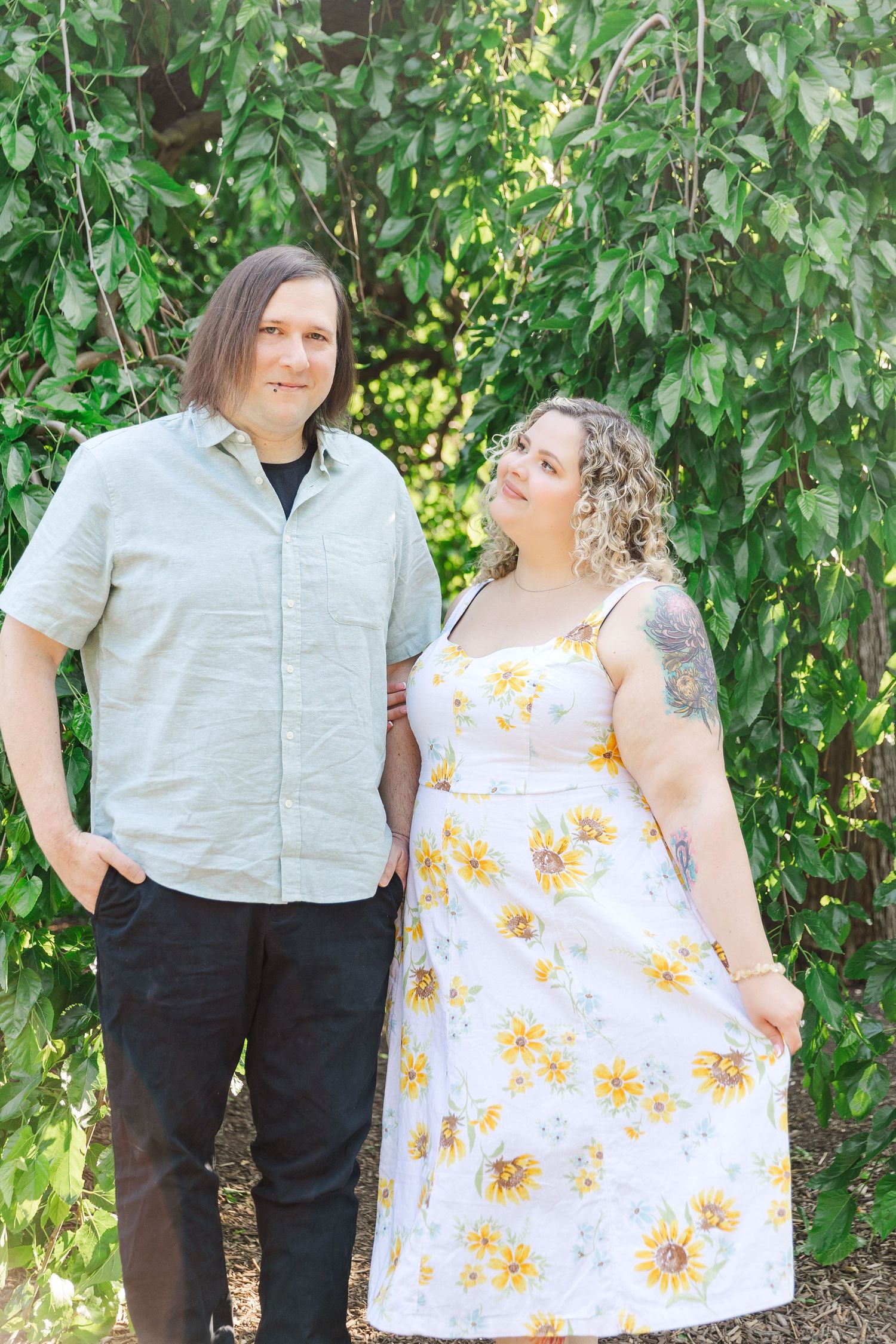 Engagement photo of couple at Lilacia Park Lombard IL at sunset
