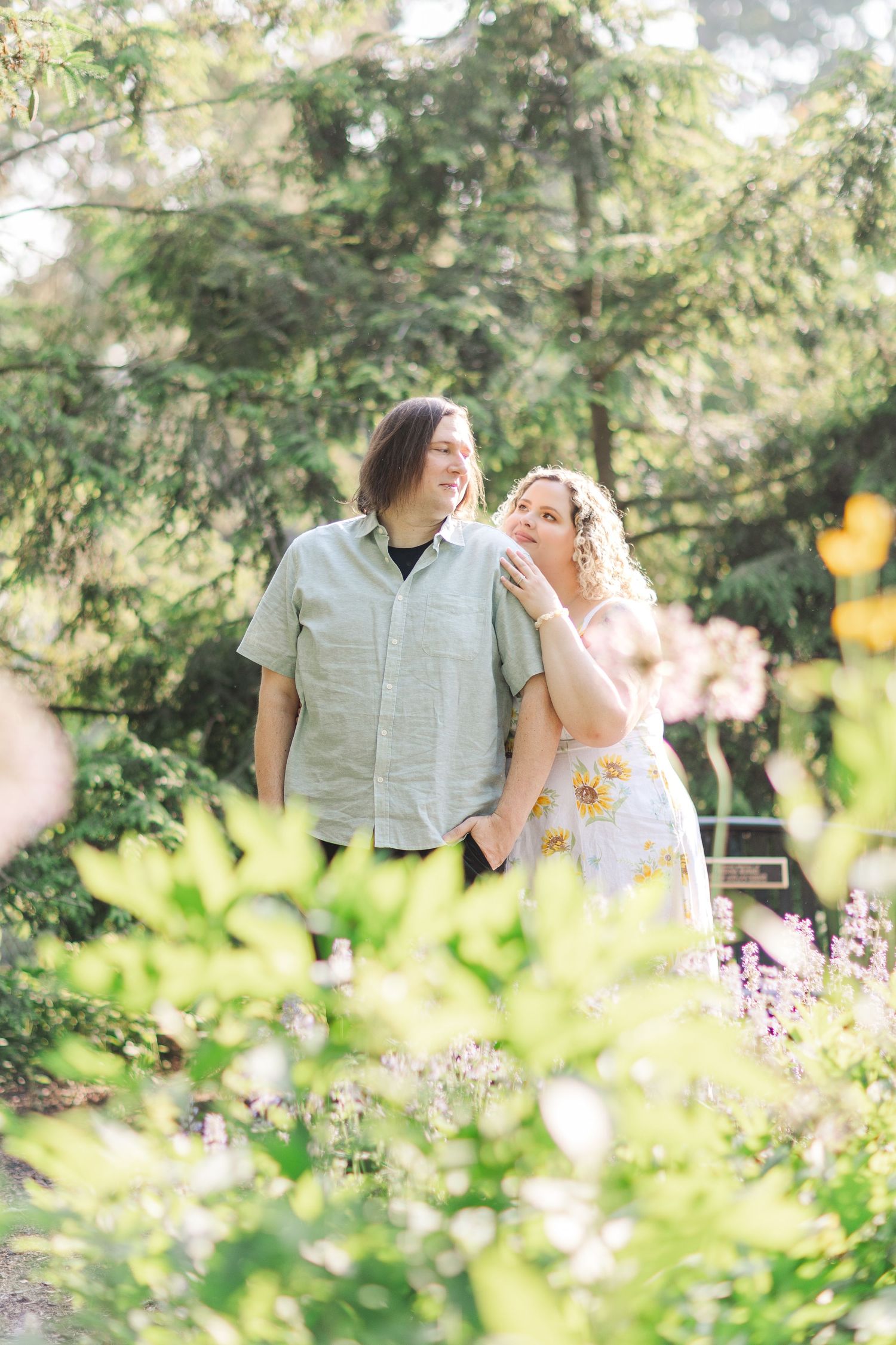 Engagement photo of couple at Lilacia Park Lombard IL at sunset