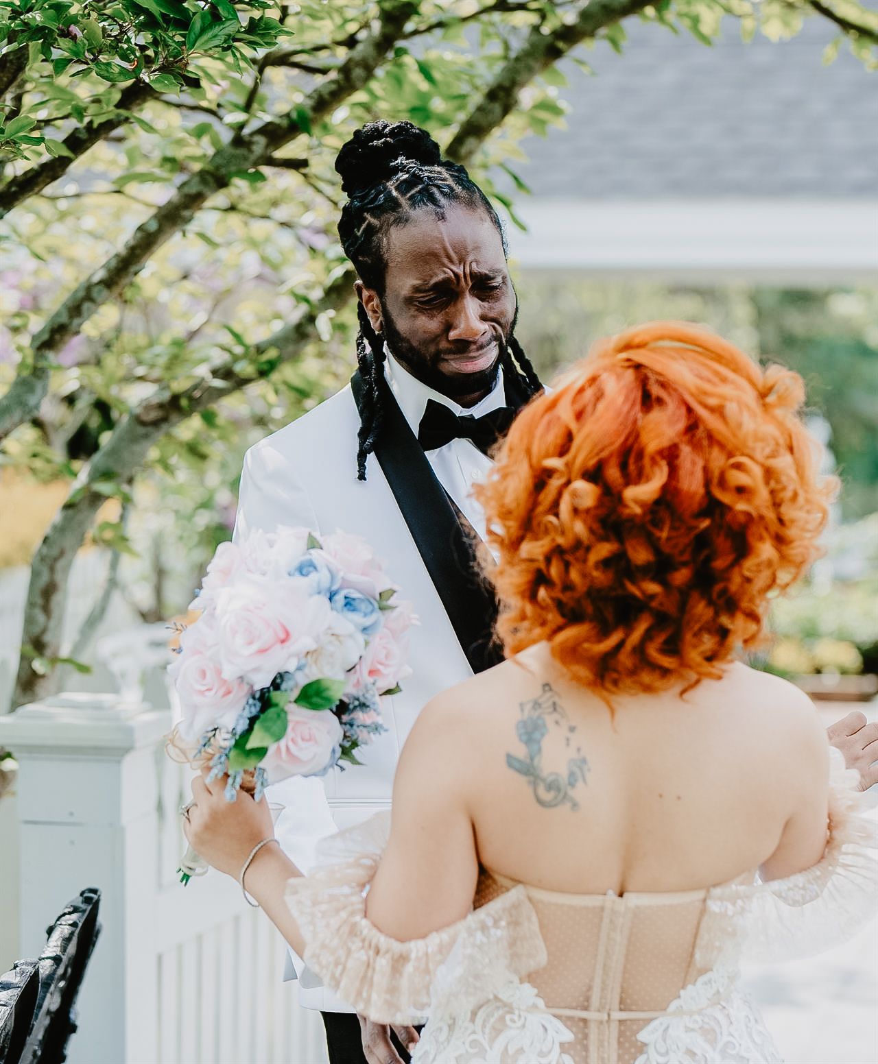 Emotional first look moment as the groom sees his bride for the first time at an intimate Lehigh Valley wedding — his genuine reaction captu