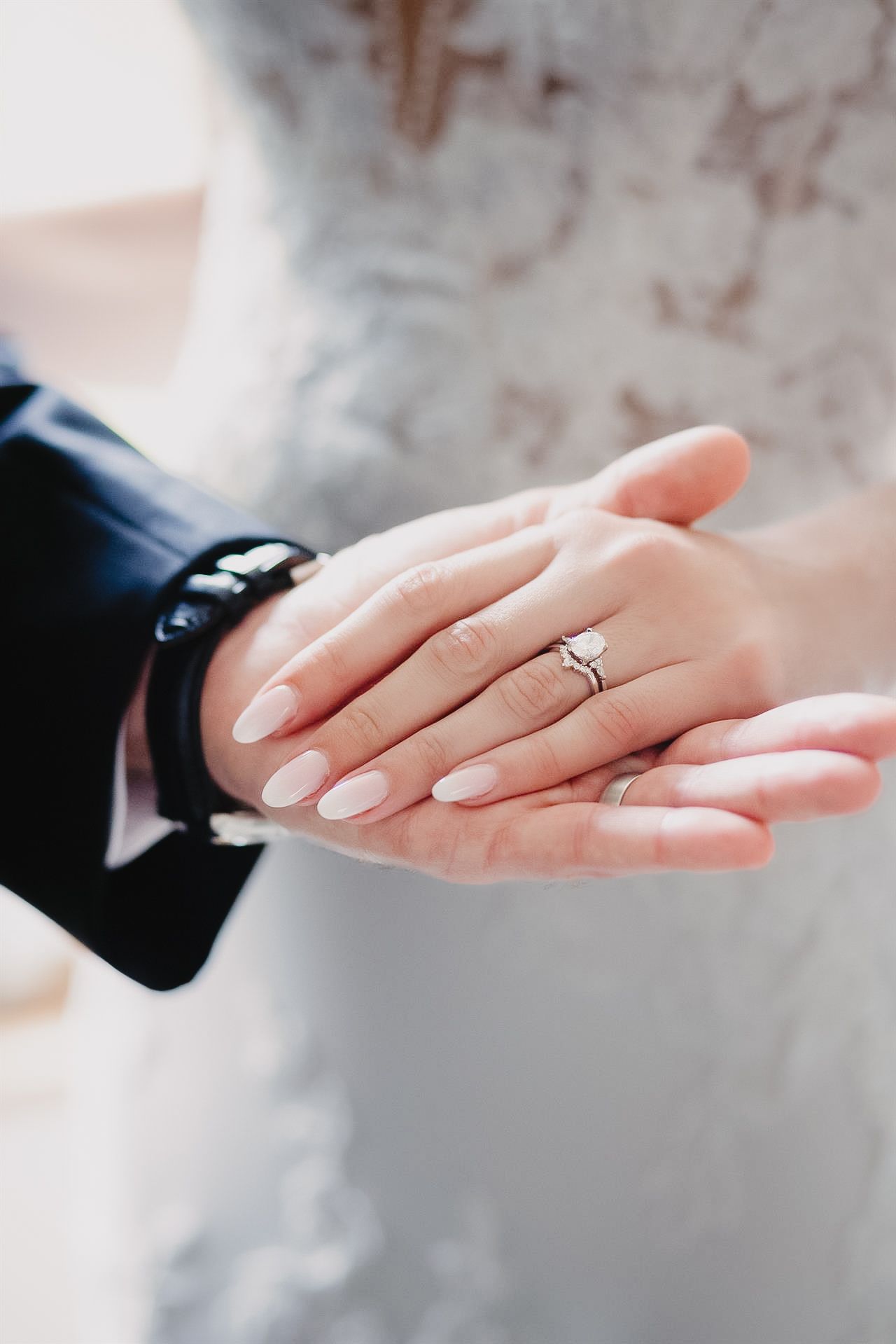 Editorial close up of wedding rings in Huntsville, AL with bright tones and pure whites