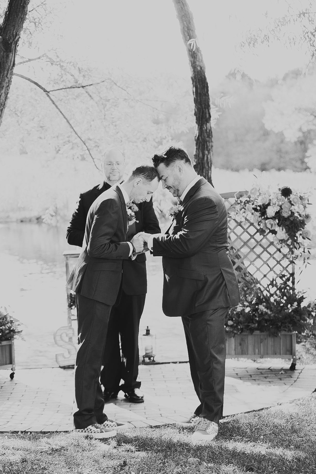 Couple's first kiss in Huntsville AL, Documentary wedding photography with a soft film aesthetic in black and white