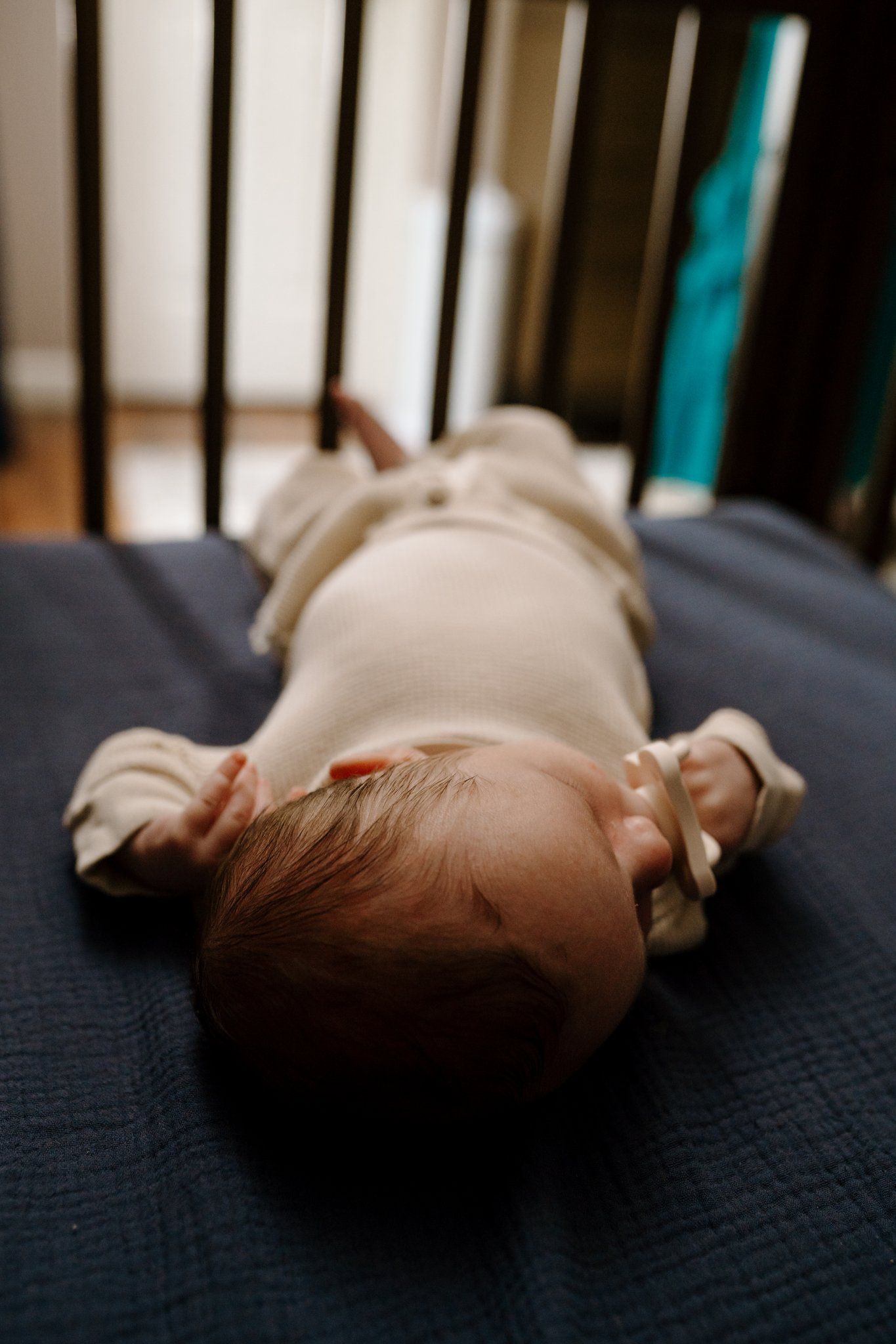 Baby sleeps in crib