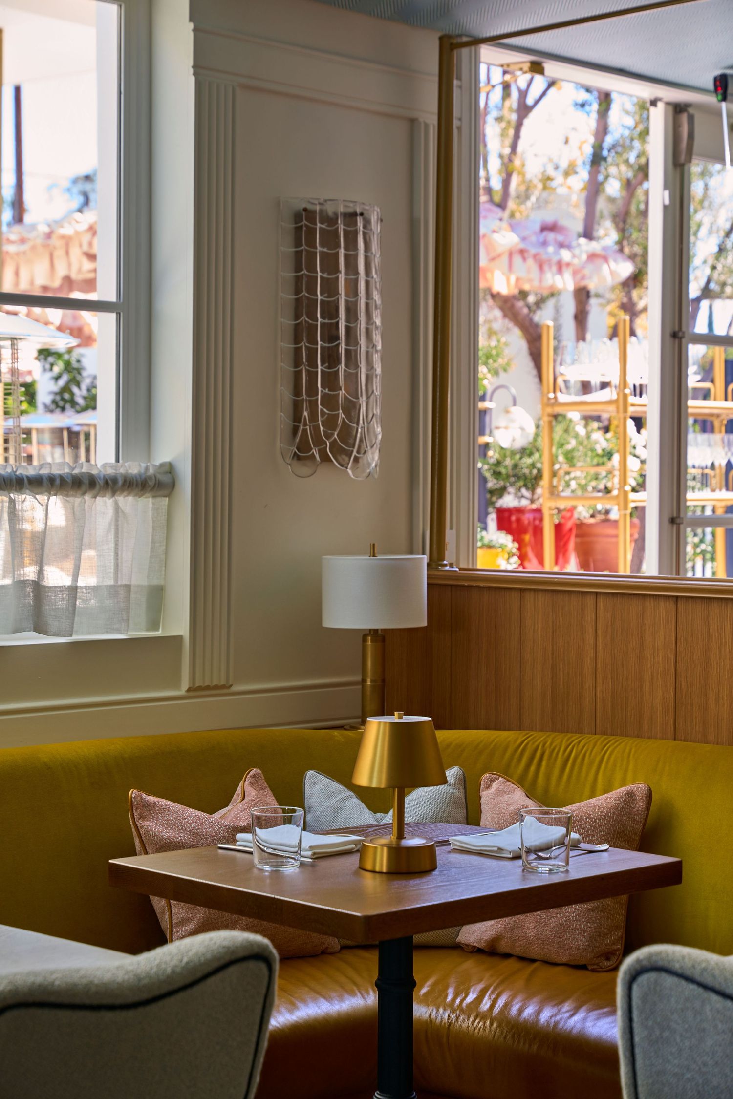 Detail picture of a yellow banquette at Chez Mia, west hollywood, LA. Design by Fettle Design