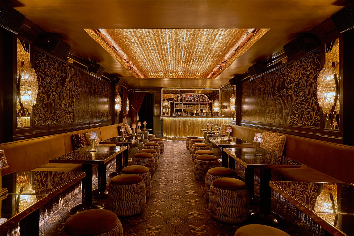 Cast Glass bar and custom chandelier designed and made by Sogni di Cristallo, at Chez Margaux in NY