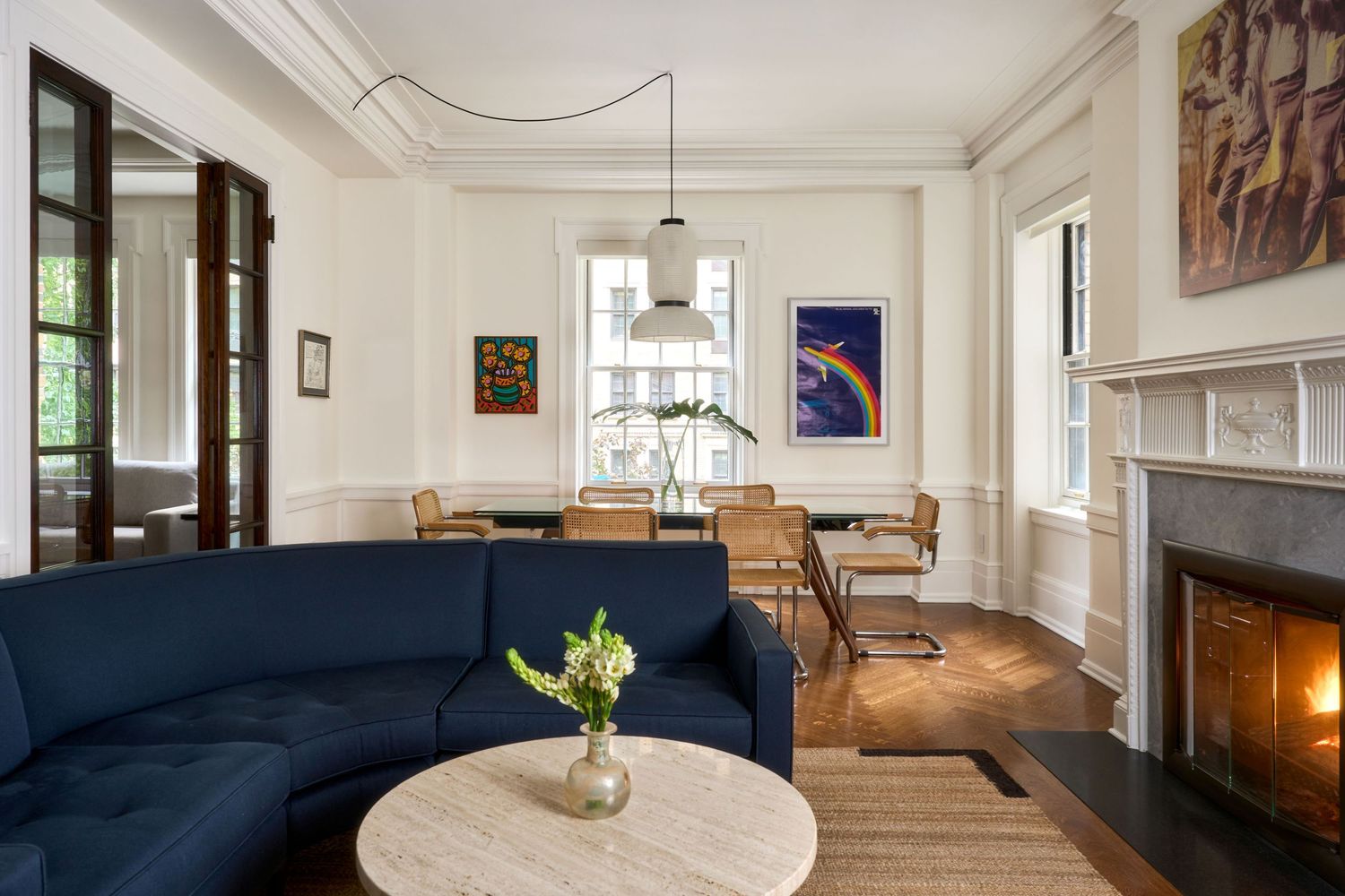 Living room with a custom blue couch, of a Lexington ave apartment, design by Varlands