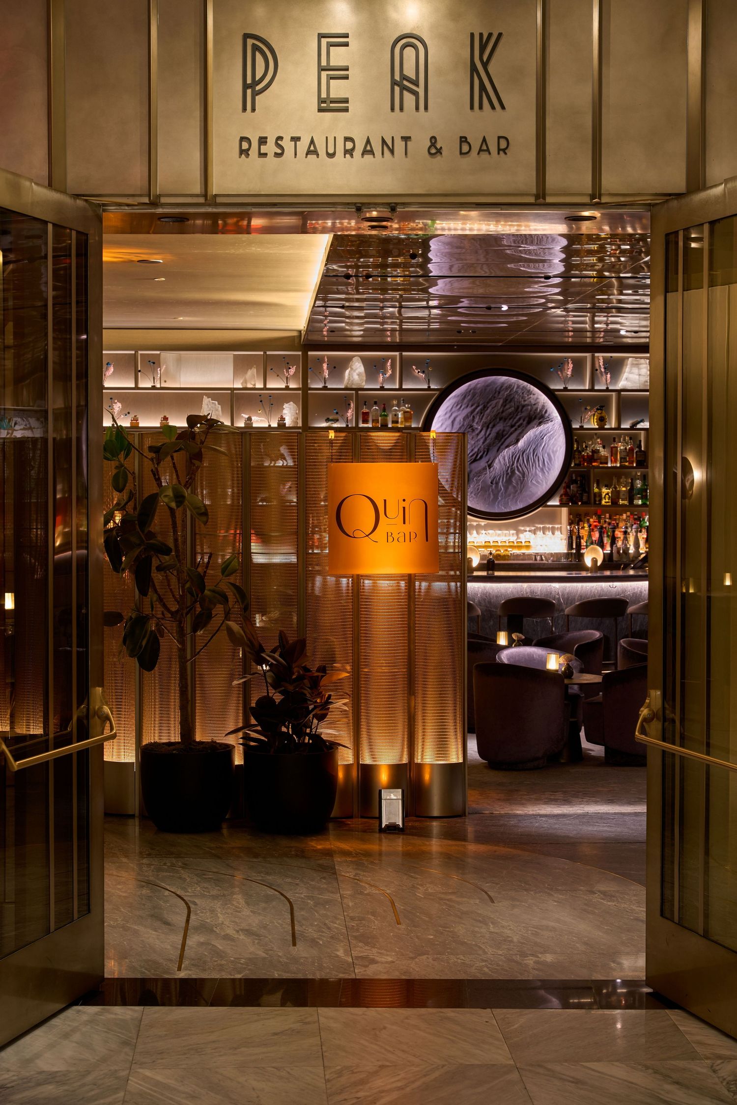 Moody interior photography of the entry of the Quin bar in Hudson yards and PEAK. NY