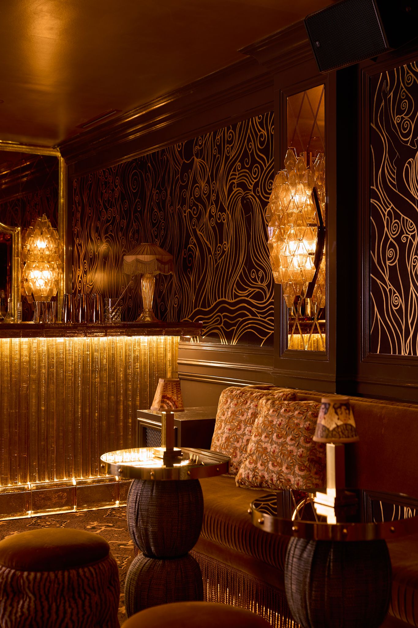 Cast Glass bar and custom chandelier designed and made by Sogni di Cristallo, at Chez Margaux in NY