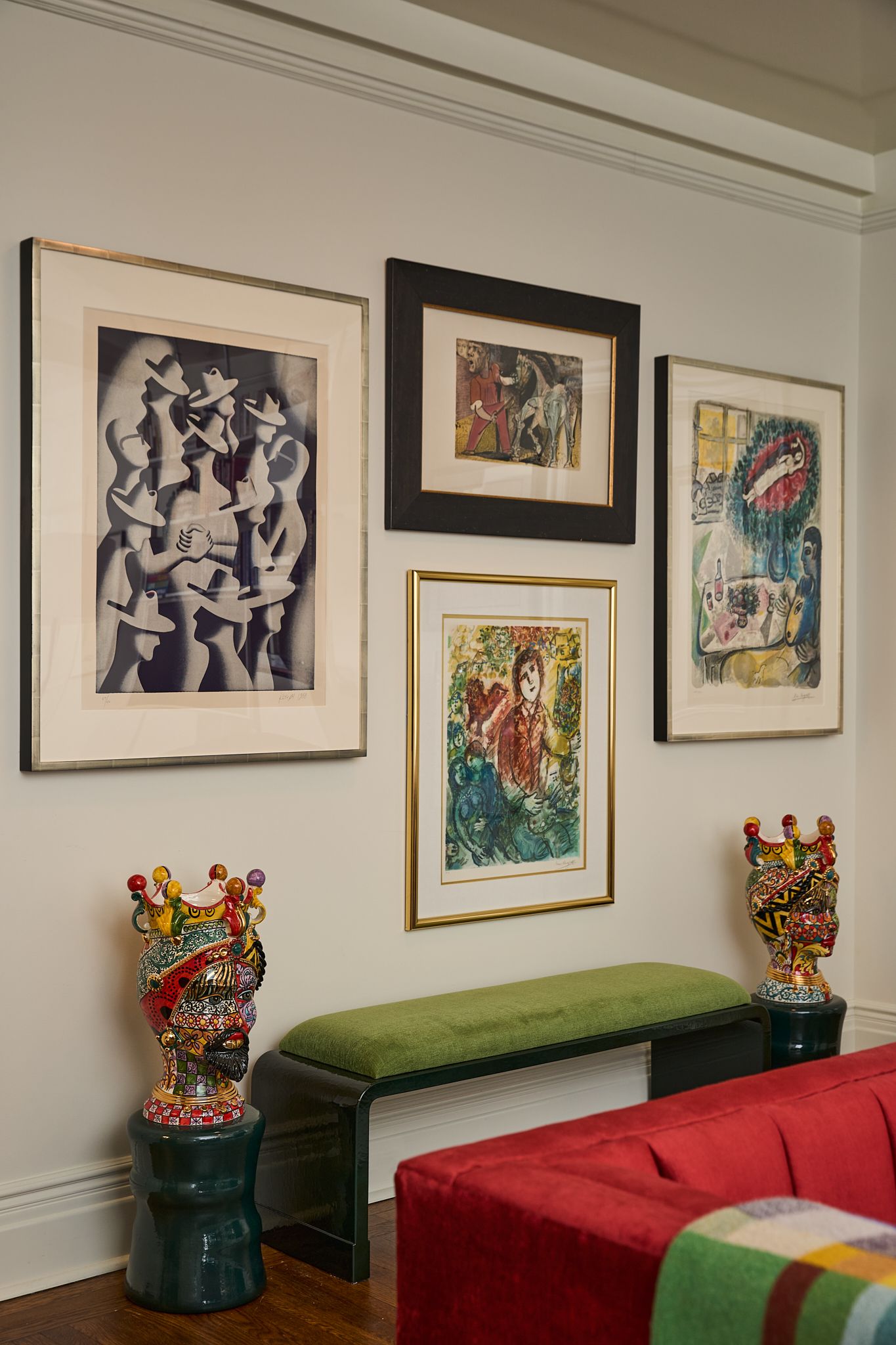wall of art and bespoke furniture in a small Park avenue apartment in NY, design by Studio Vogelsang