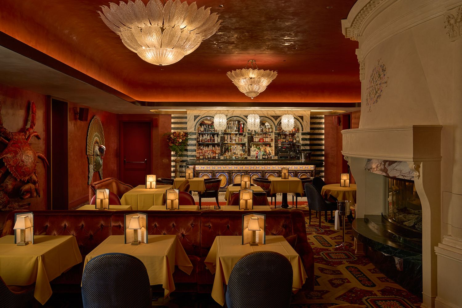 Picture of a dining room and bar at Zou zou's club, in Hudson Yards, NY. Crystal chandelier and Designed by Ken Fulk