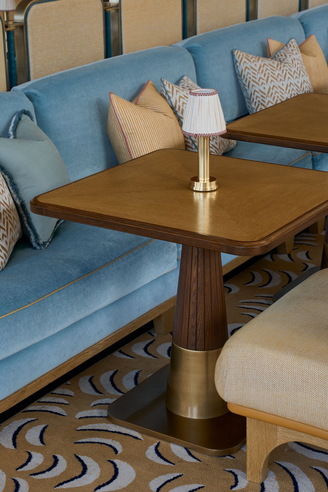 Bar overview, Bar Sprezzatura in San Francisco, CA.
Blue sofa and wood table