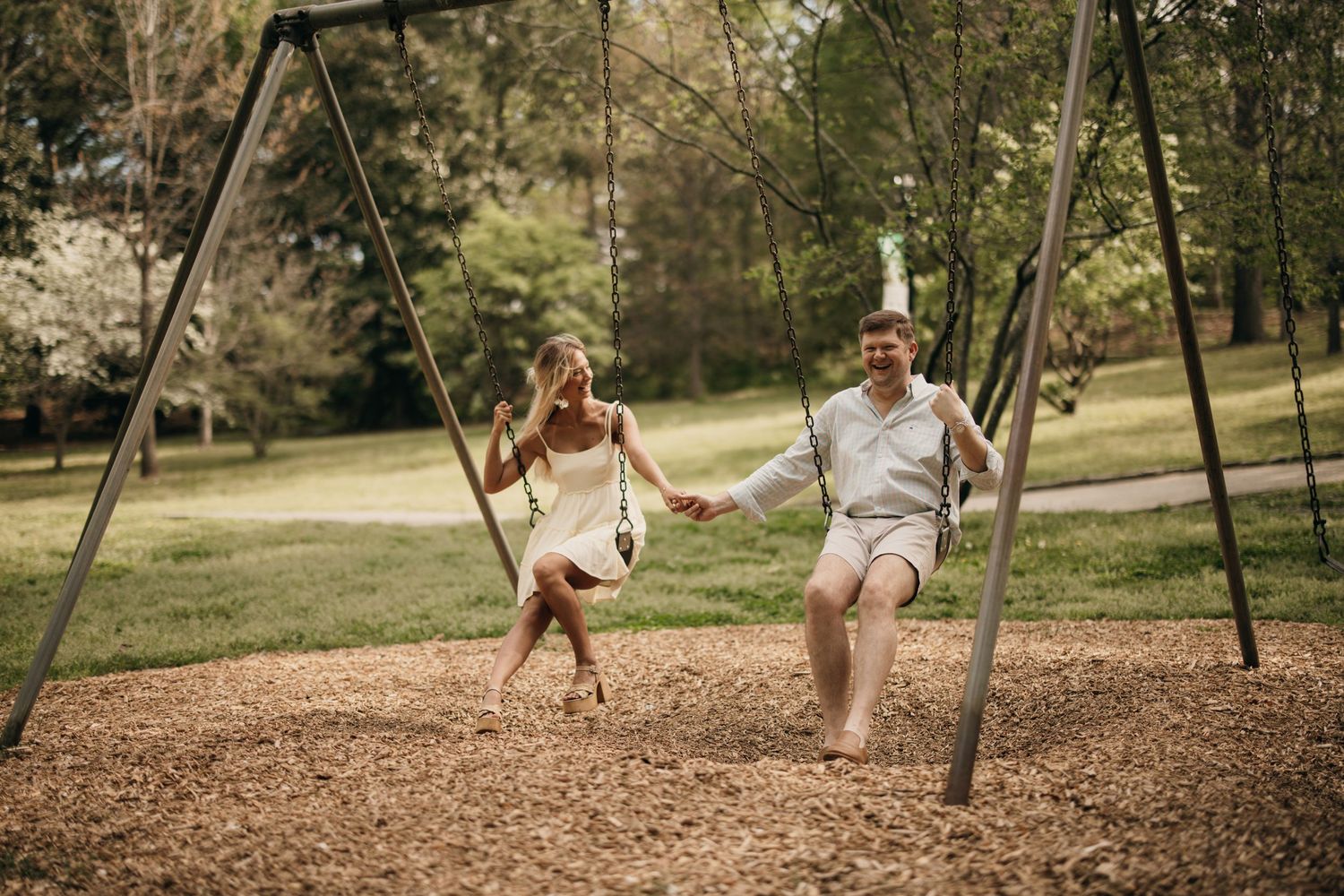 fun, loving couple engagement session in Grant Park, Atlanta, Georgia. Documentary-style engagement photography, candid couples photography