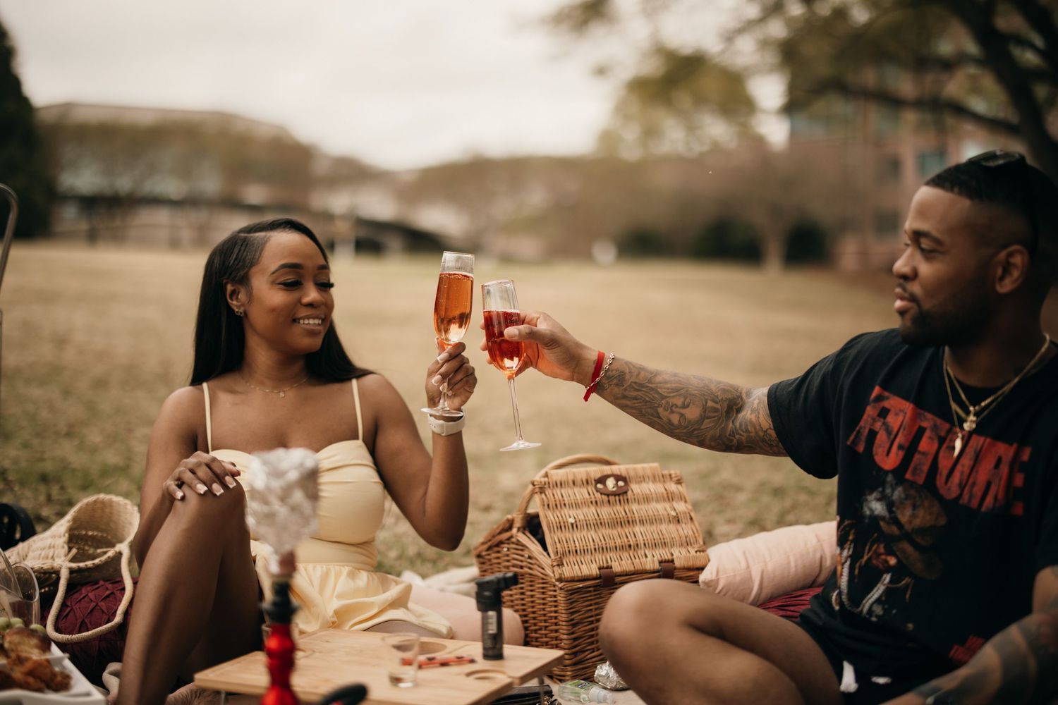 black couple having romantic picnic near Atlantic Station in Atlanta, georgia. candid, documentary-style couples photography