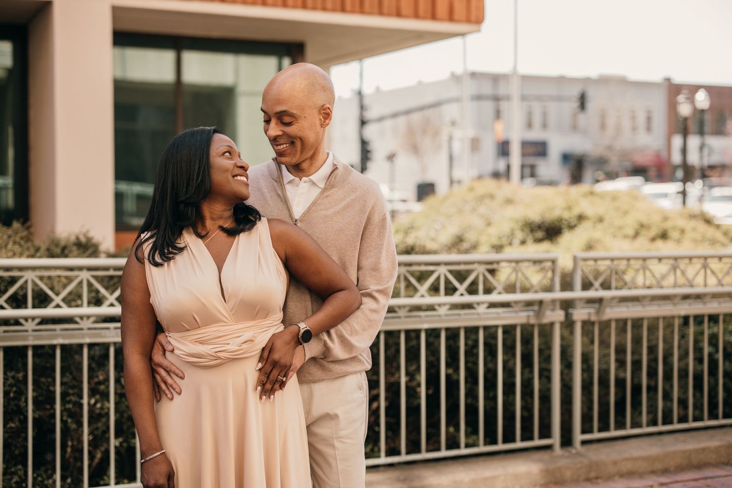 black couple hugging during beautiful engagement session in Marietta, georgia.