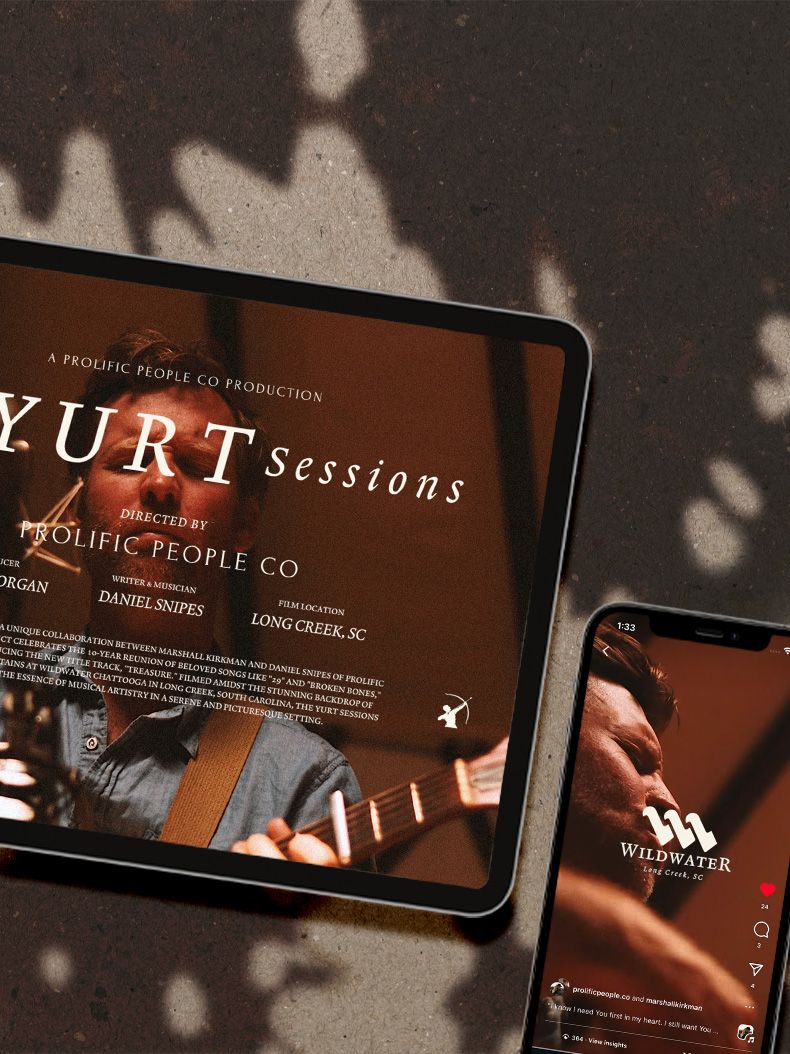 Dark moody mockup of website designs displayed across multiple devices and screens.