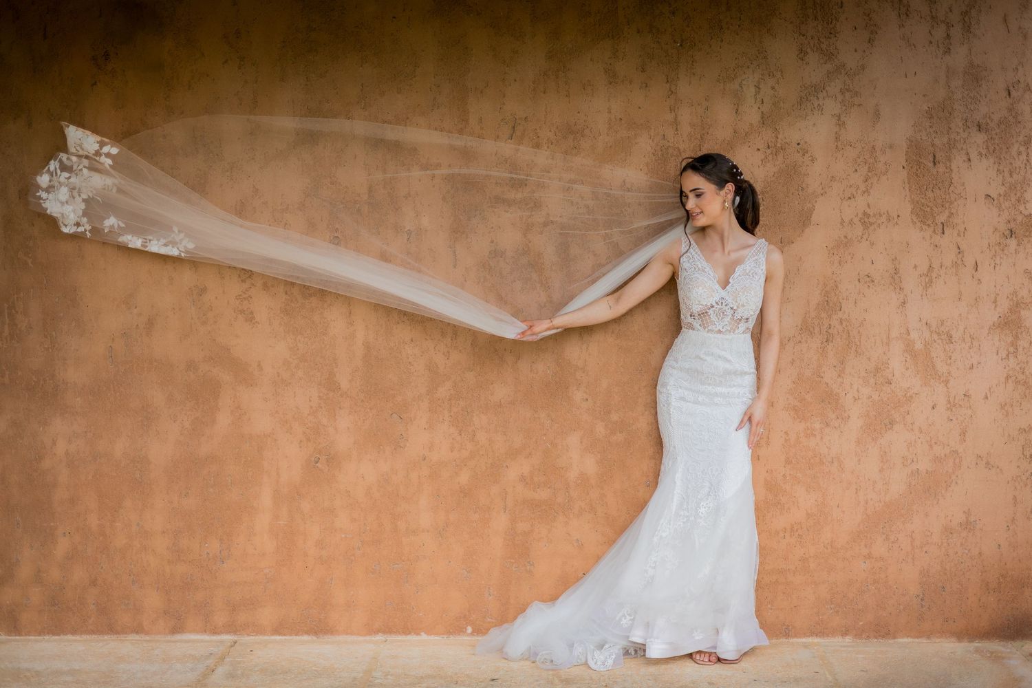 couple at sittella winery wedding, vineyard wedding, photos by willie thow photography, gown designed by Meeting Grace Bridal