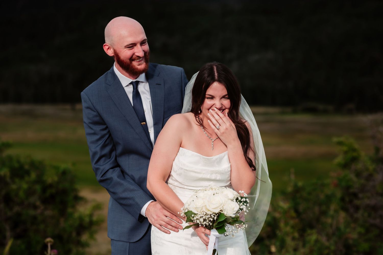 An emotional candid moment captured during a mountain wedding ceremony.