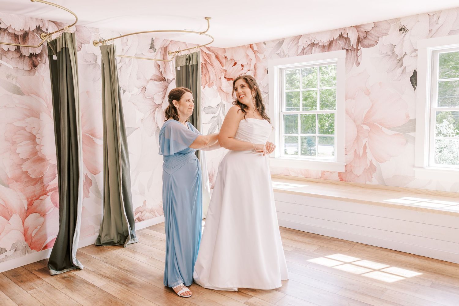 Elegant wedding photography collage showing tender moments between couples in a bright, sunlit room with marble walls.