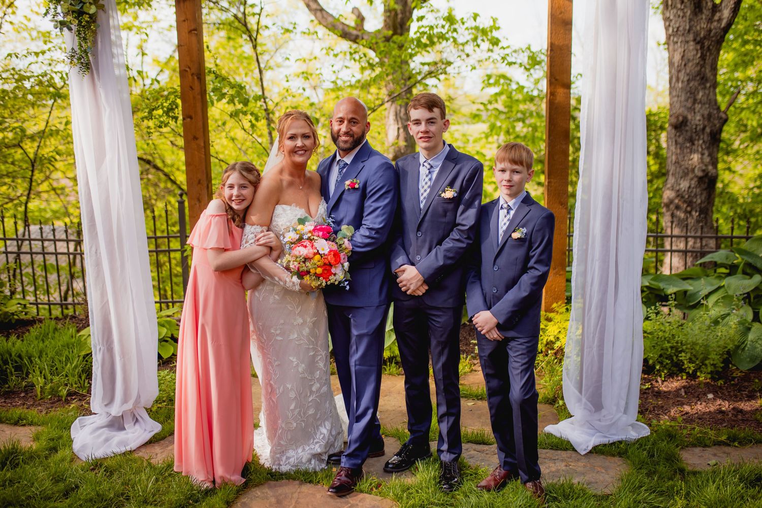 Wedding family together at Affinity Riverside Estates in Nixa Missouri.