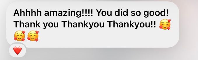 A brief social media comment showing appreciation with heart and raised hands emojis.