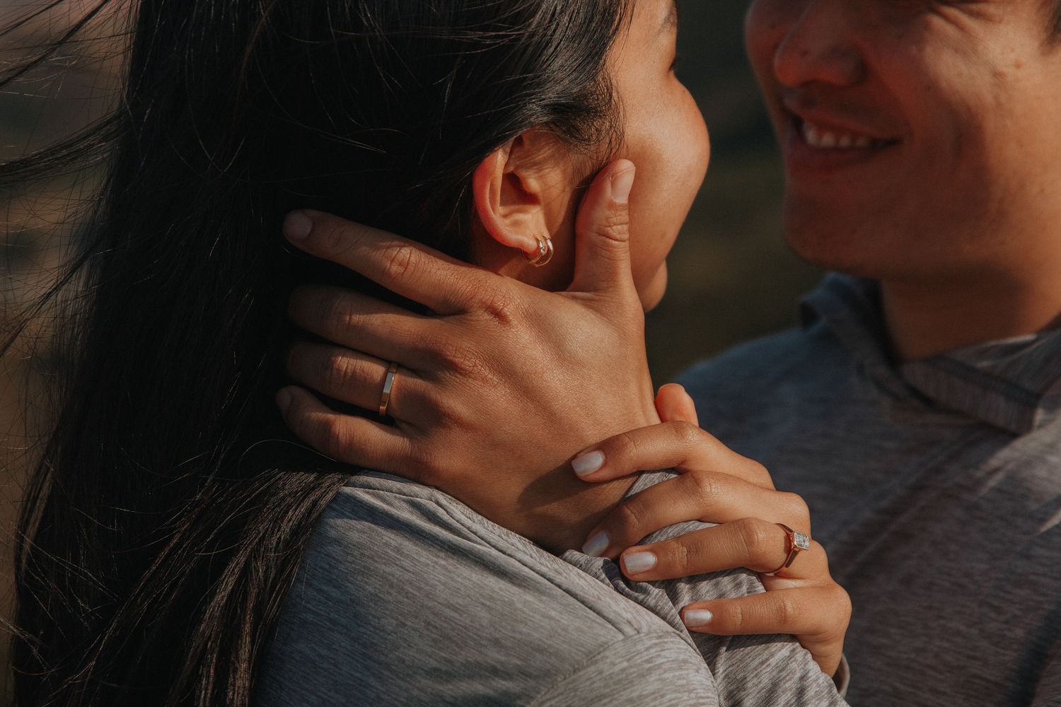 A row of romantic candid photos shows a couple holding hands and embracing while sitting together.