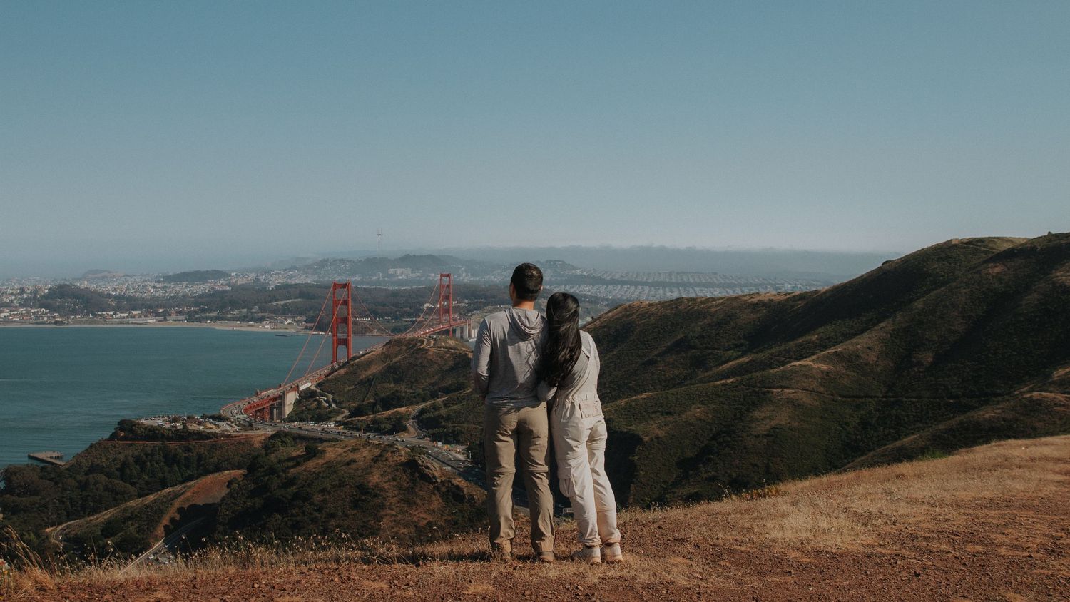 Panoramic photo sequence of scenic coastal views with the Golden Gate Bridge visible in the distance.