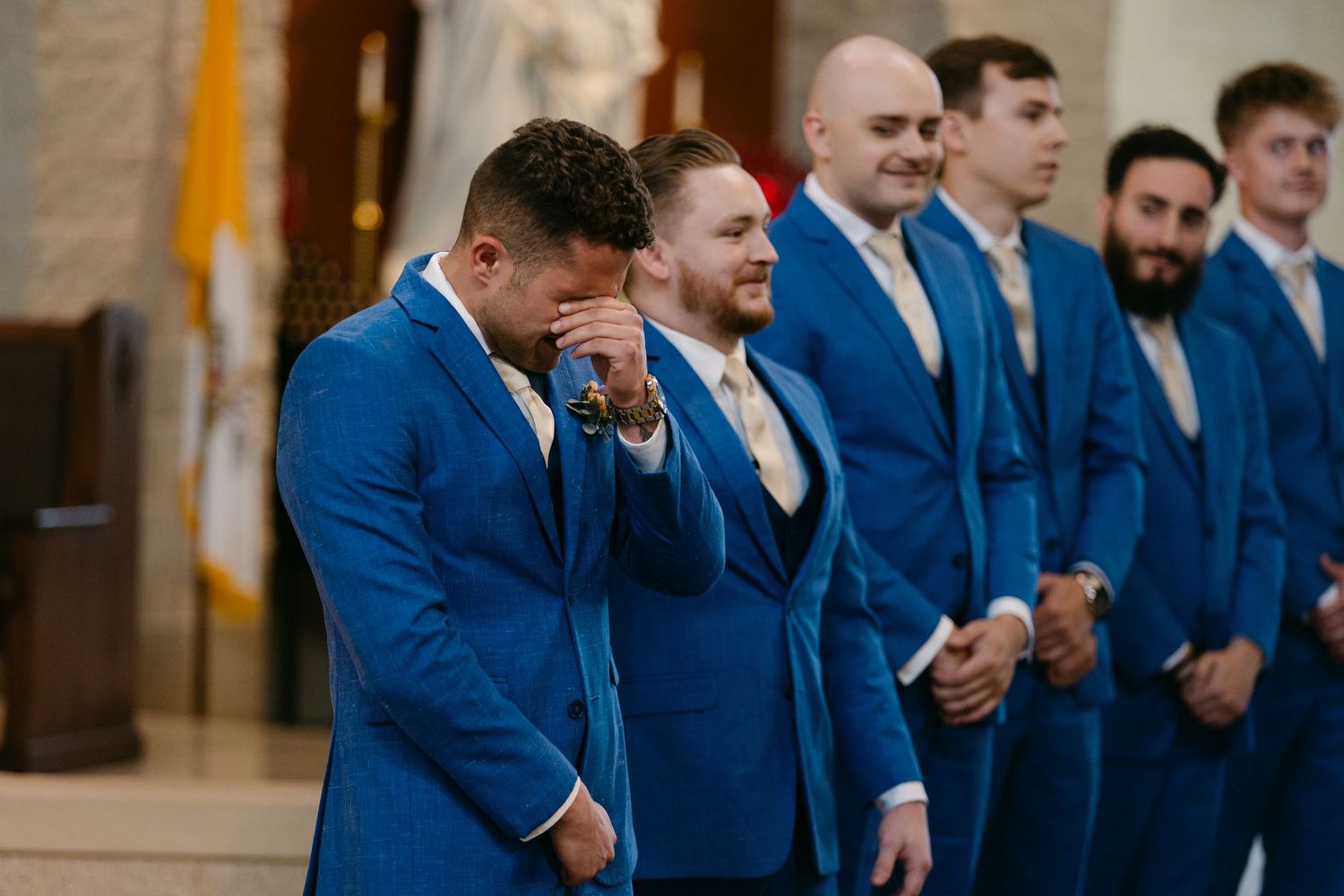 Lincoln NE church wedding ceremony with elegant stained glass. Classic Midwest church wedding in Lincoln NE with emotional vows