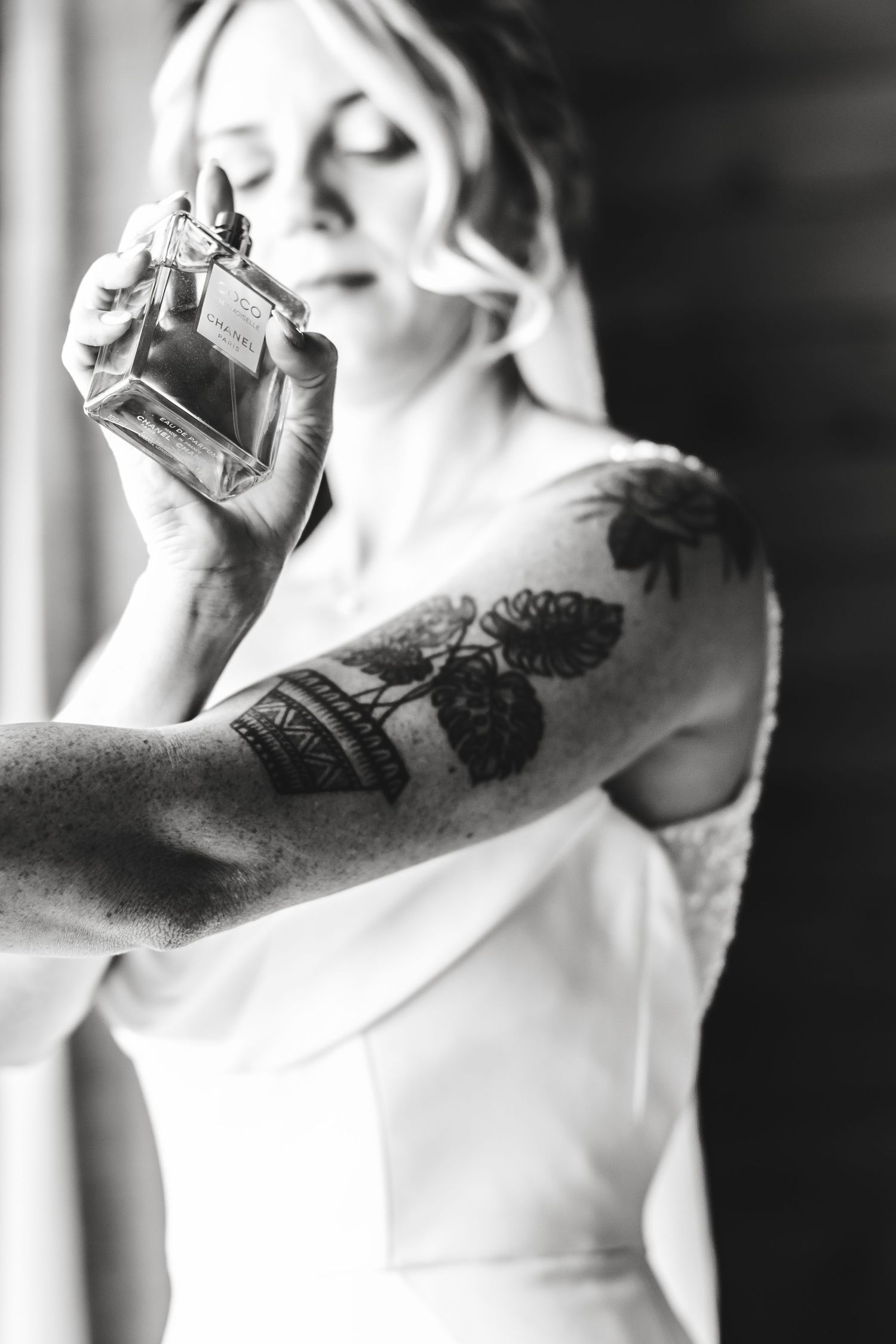 A black and white triptych sequence shows someone smoking a cigarette in an artistic style.