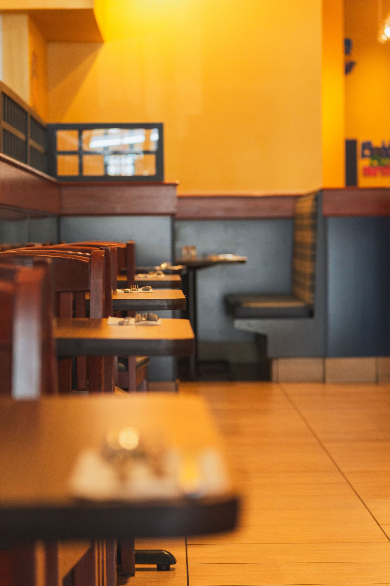 Cora’s restaurant interior design with cheerful yellow color palette