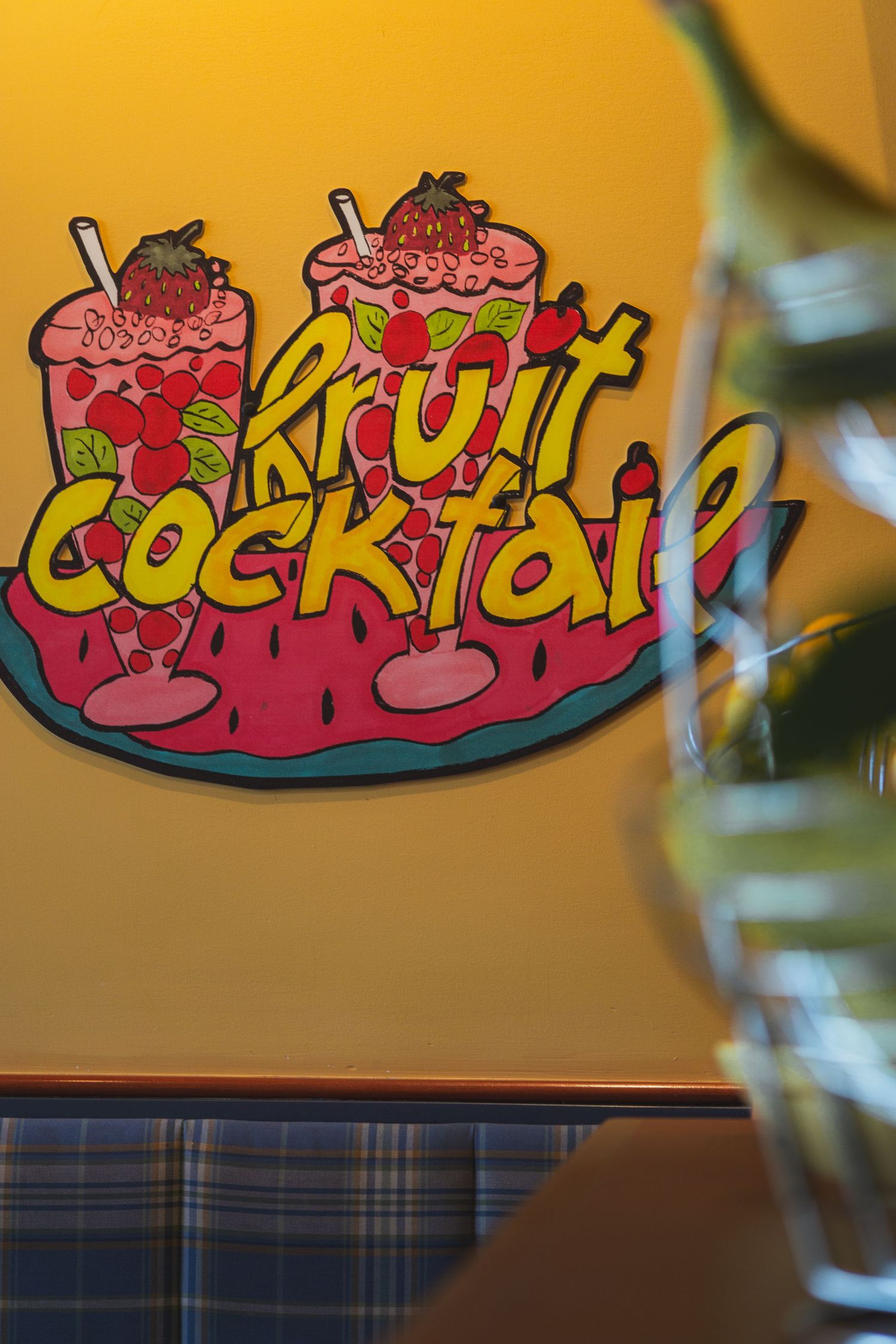 Cora’s restaurant interior design with cheerful yellow color palette in Victoria, Canada