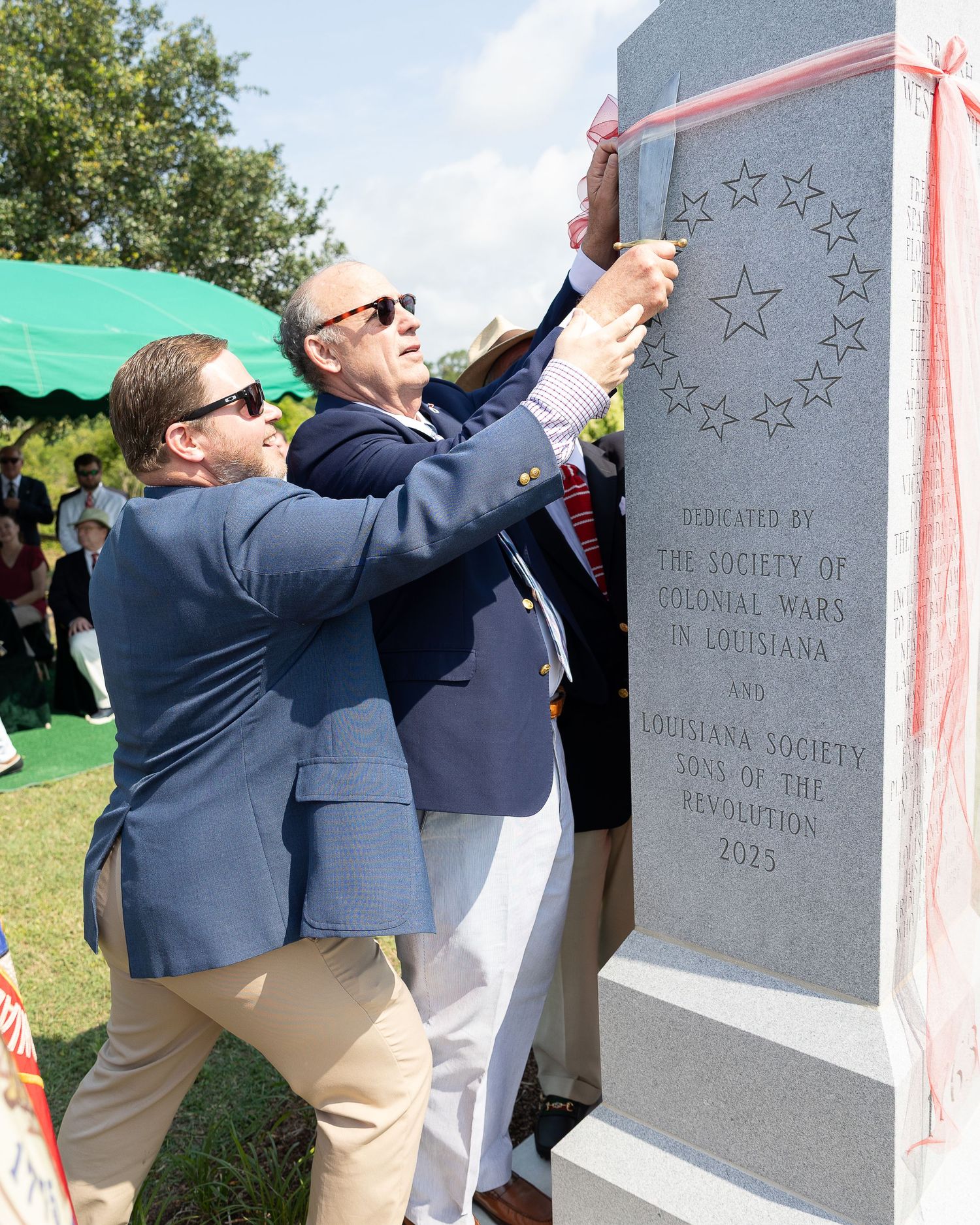 Outdoor event photography session at mandeville louisiana monument dedication ceremony.