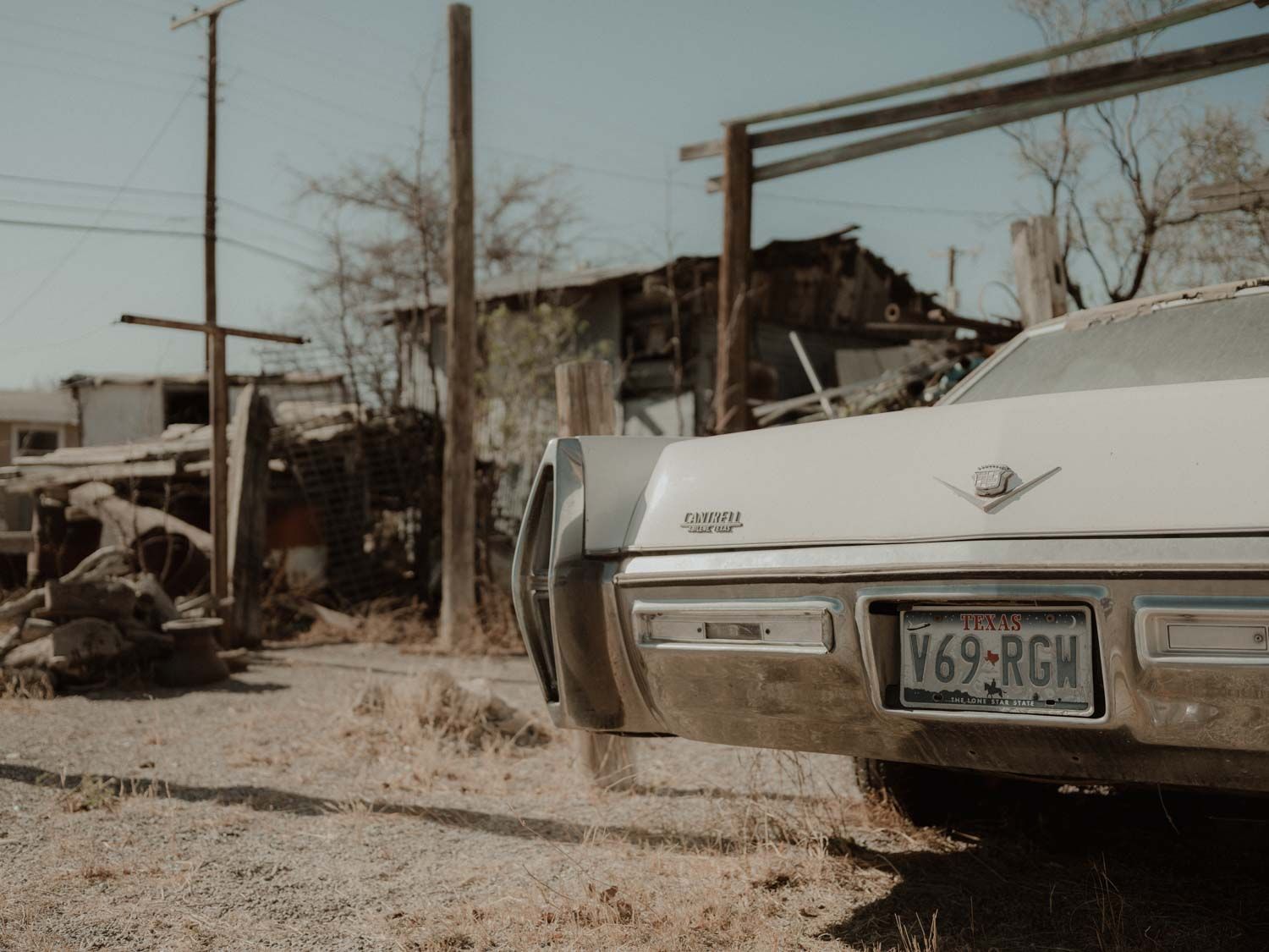 Vintage car in desert — cinematic elopement moodboard inspiration for wild weddings in Portugal