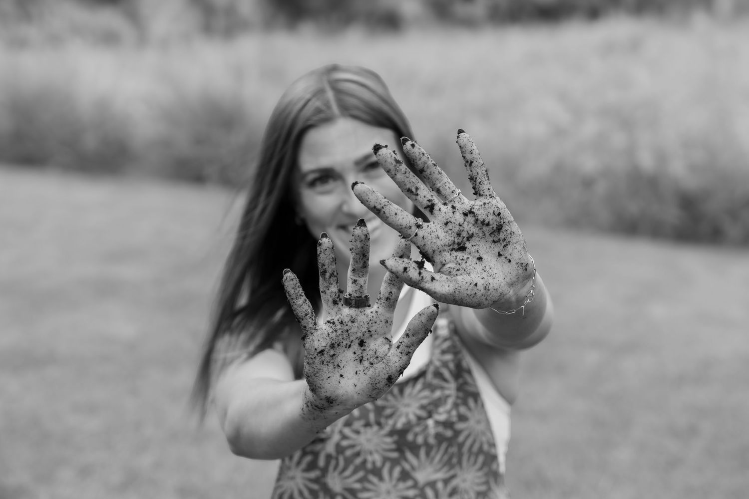 A sequence of photos shows children playing and getting messy with mud during an outdoor activity.