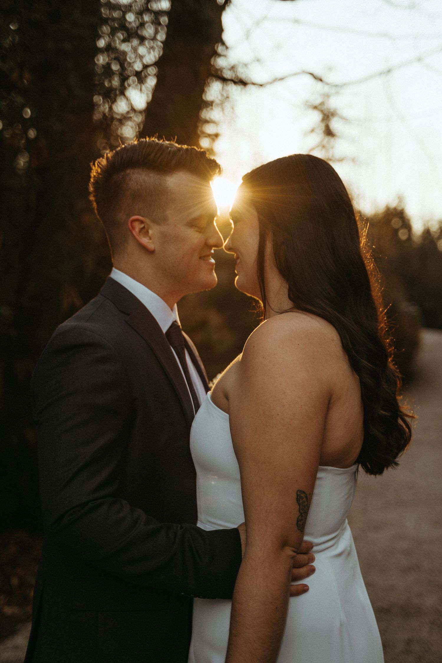 Intimate wedding photography session in golden hour light, Stanley Park, Vancouver BC